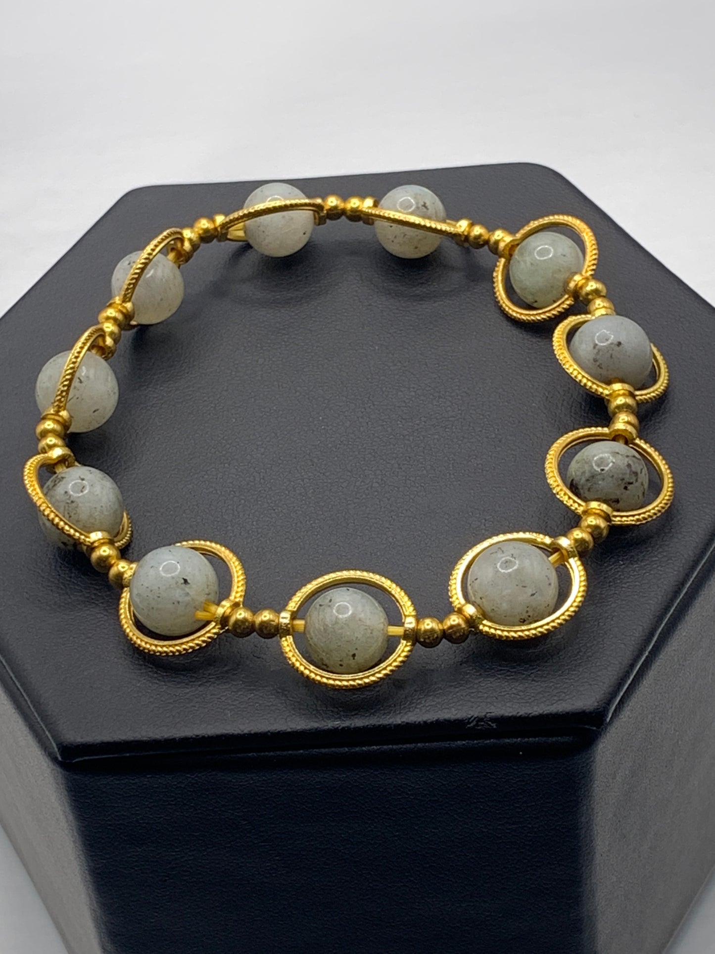 Labradorite semi precious stone/crystal elastic beaded bracelet with gold colored rings