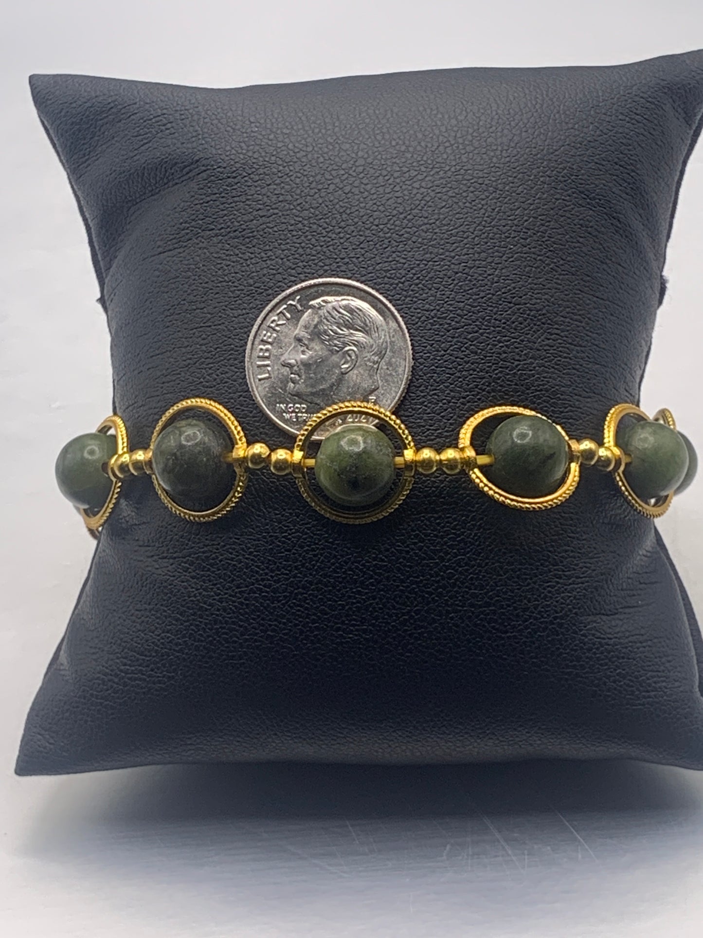 Green jade semi precious stone/crystal elastic beaded bracelet with gold colored rings