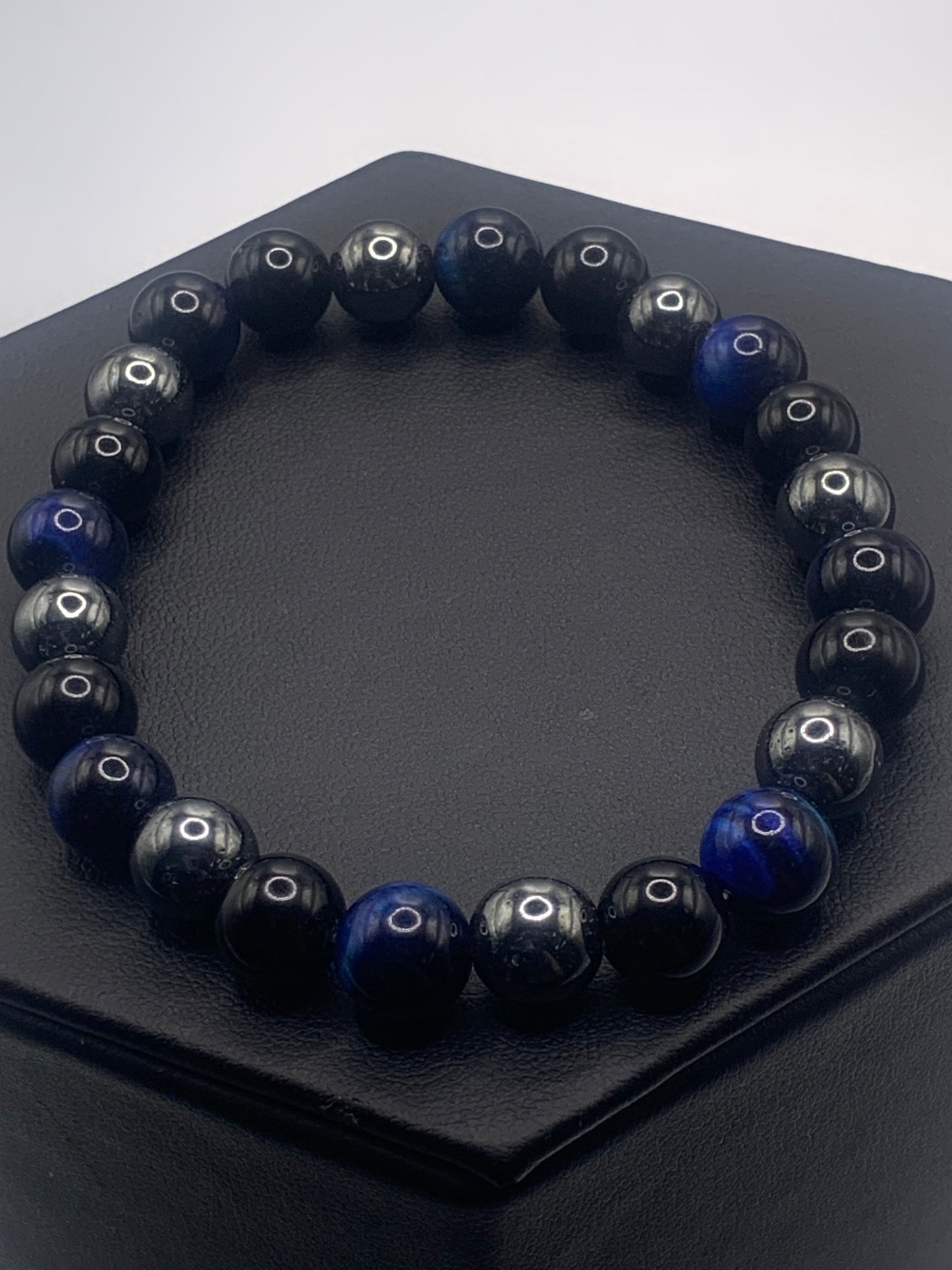 Hematite, black obsidian, and blue tigers eye semi precious stone/crystal elastic beaded bracelet
