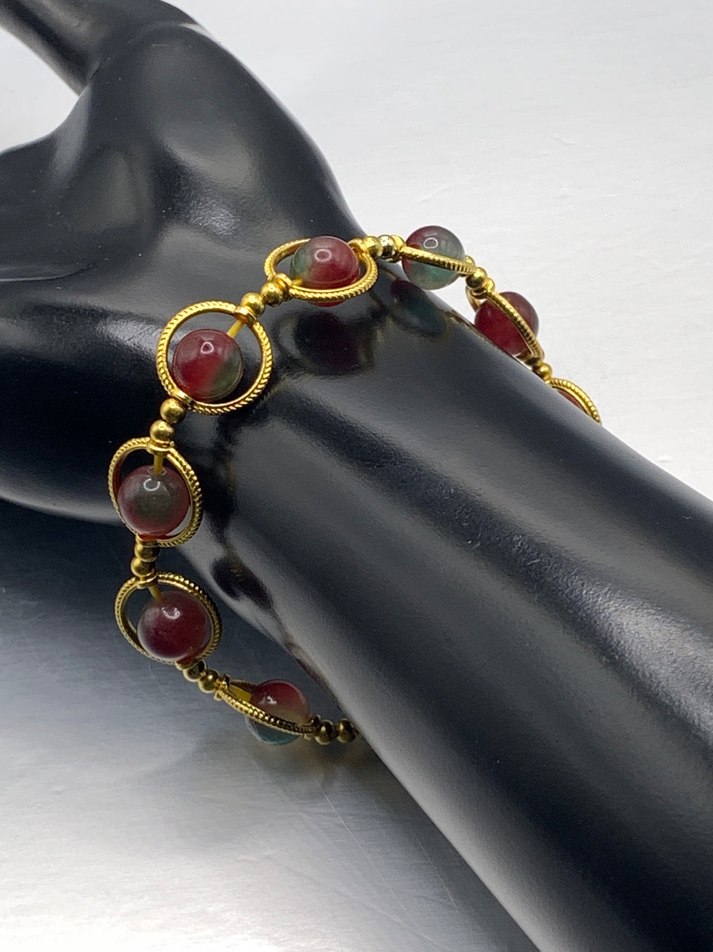 Blueberry chalcedony semi precious stone/crystal elastic beaded bracelet with gold colored rings