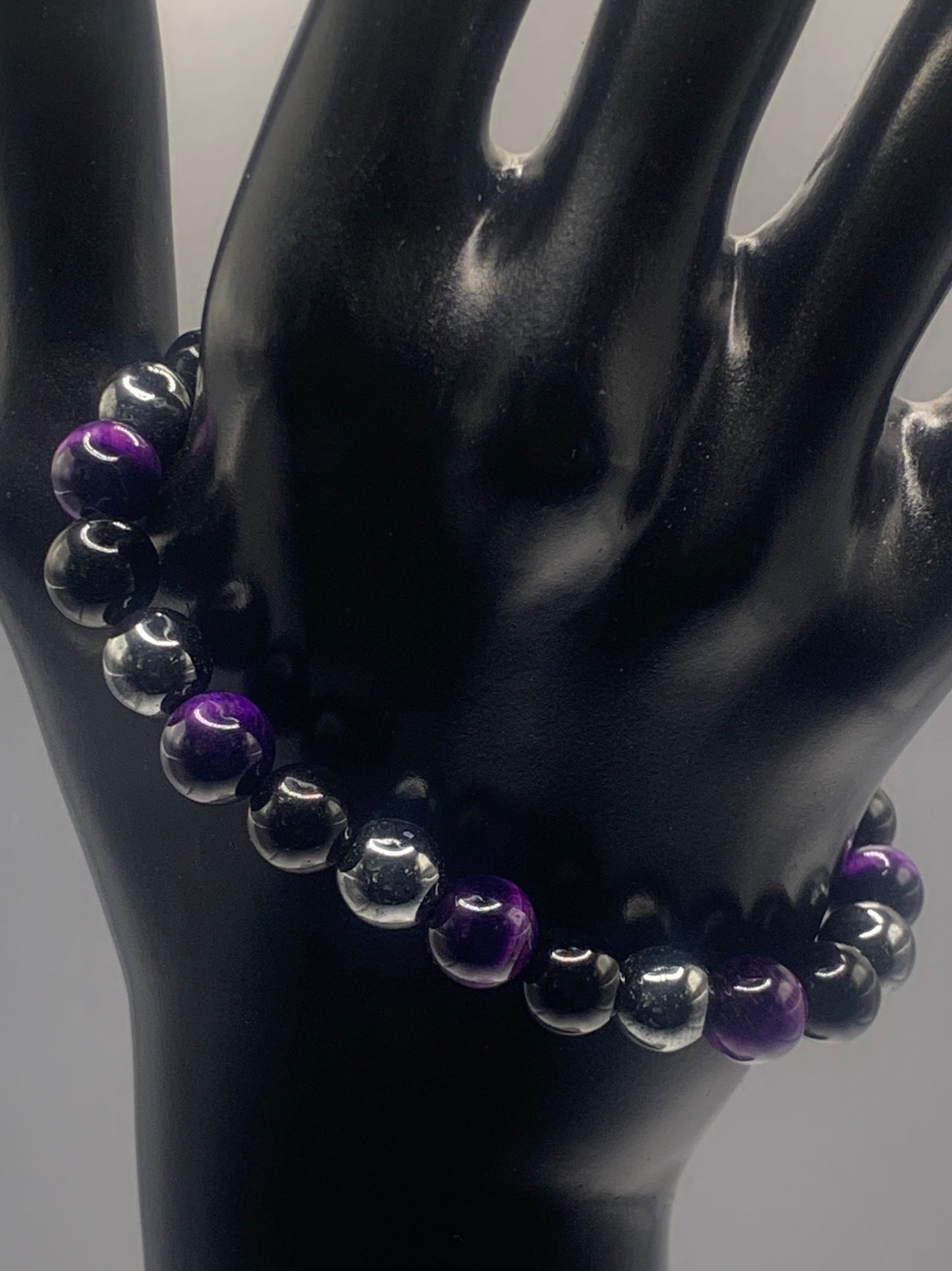 Hematite, black obsidian, and purple tigers eye semi precious stone/crystal elastic beaded bracelet