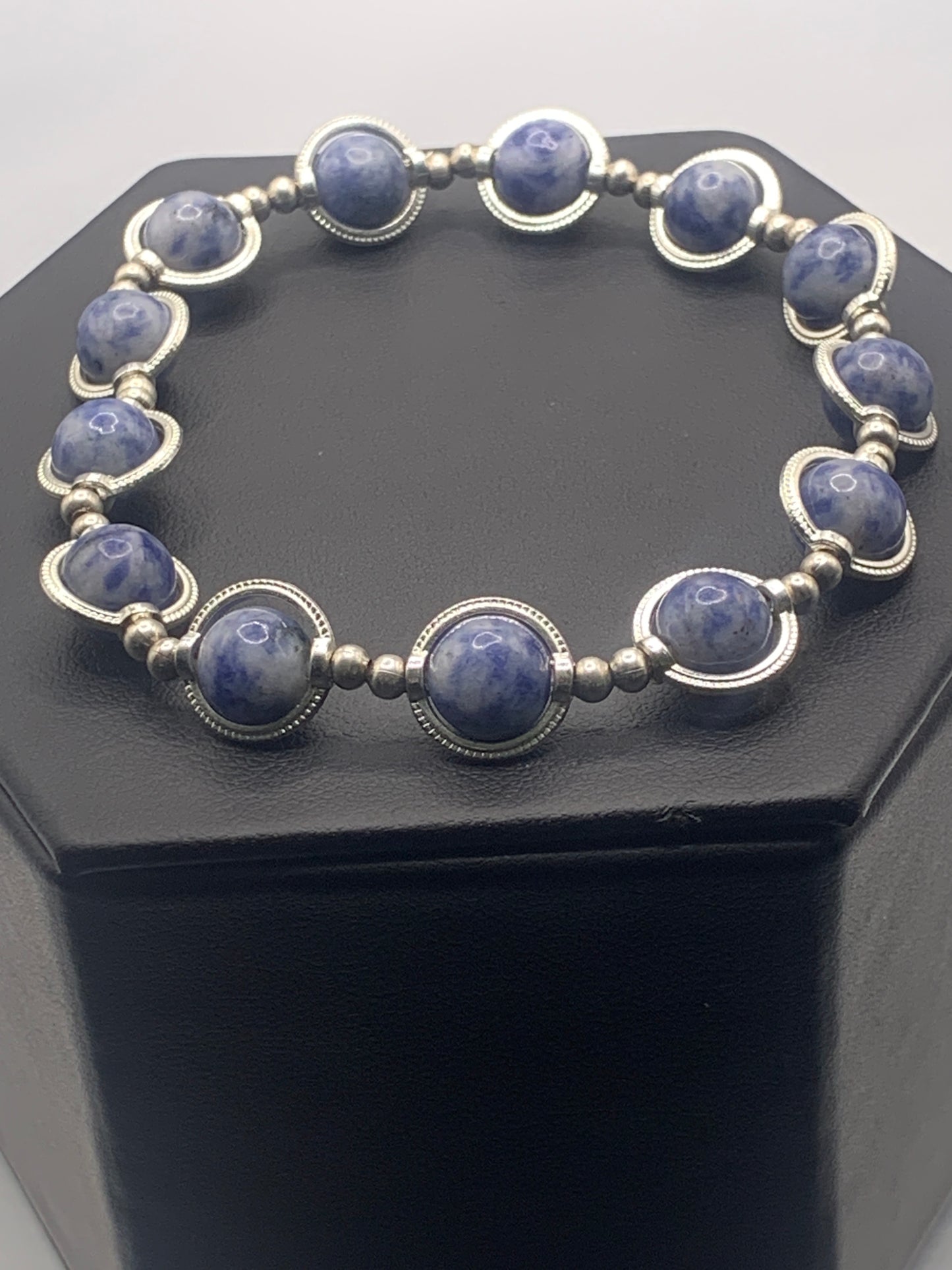 Blue dot jasper semi precious stone/crystal elastic beaded bracelet with silver colored rings