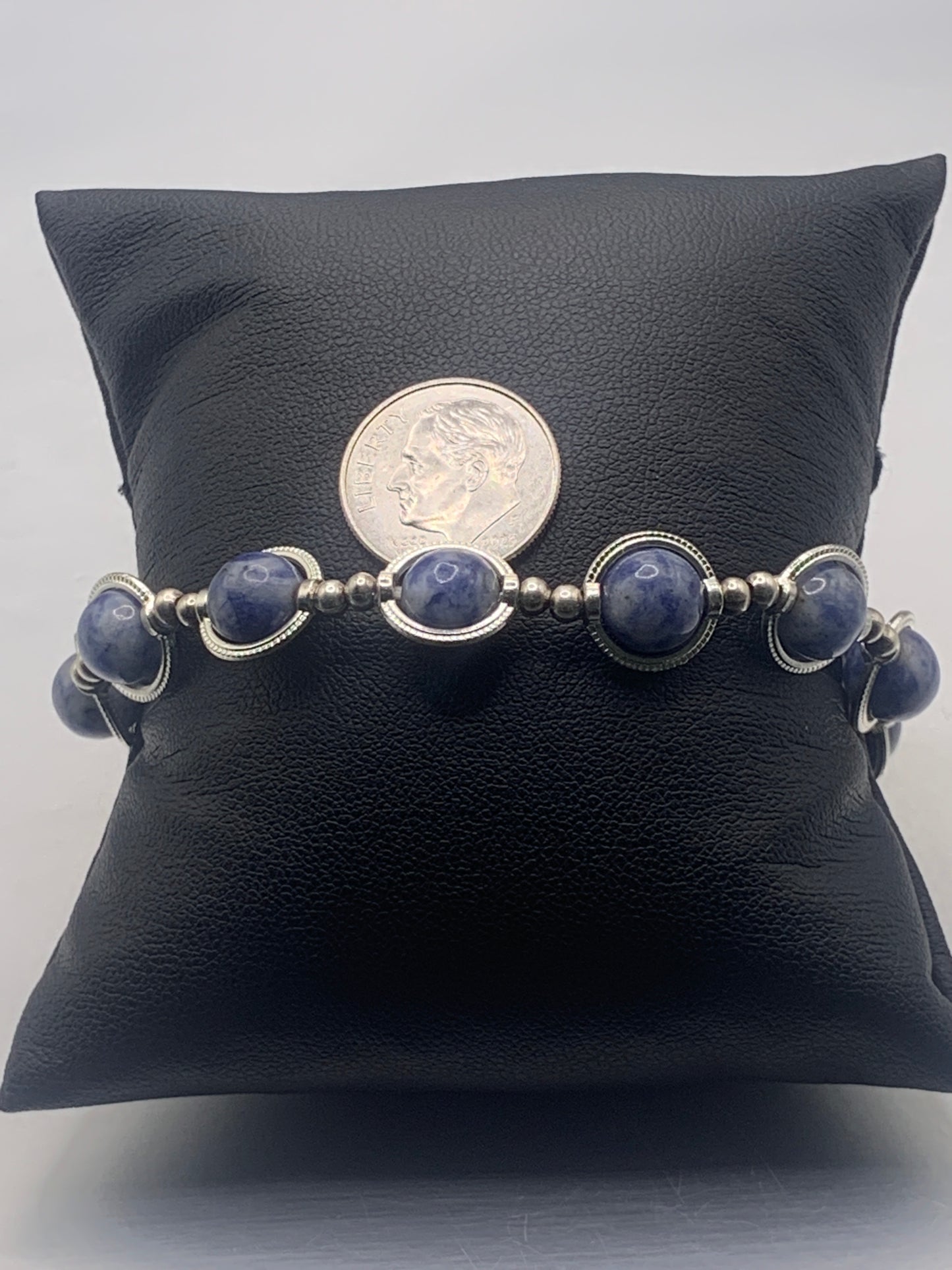 Blue dot jasper semi precious stone/crystal elastic beaded bracelet with silver colored rings