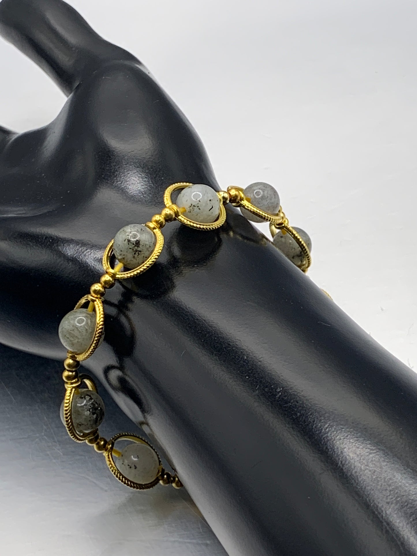 Labradorite semi precious stone/crystal elastic beaded bracelet with gold colored rings