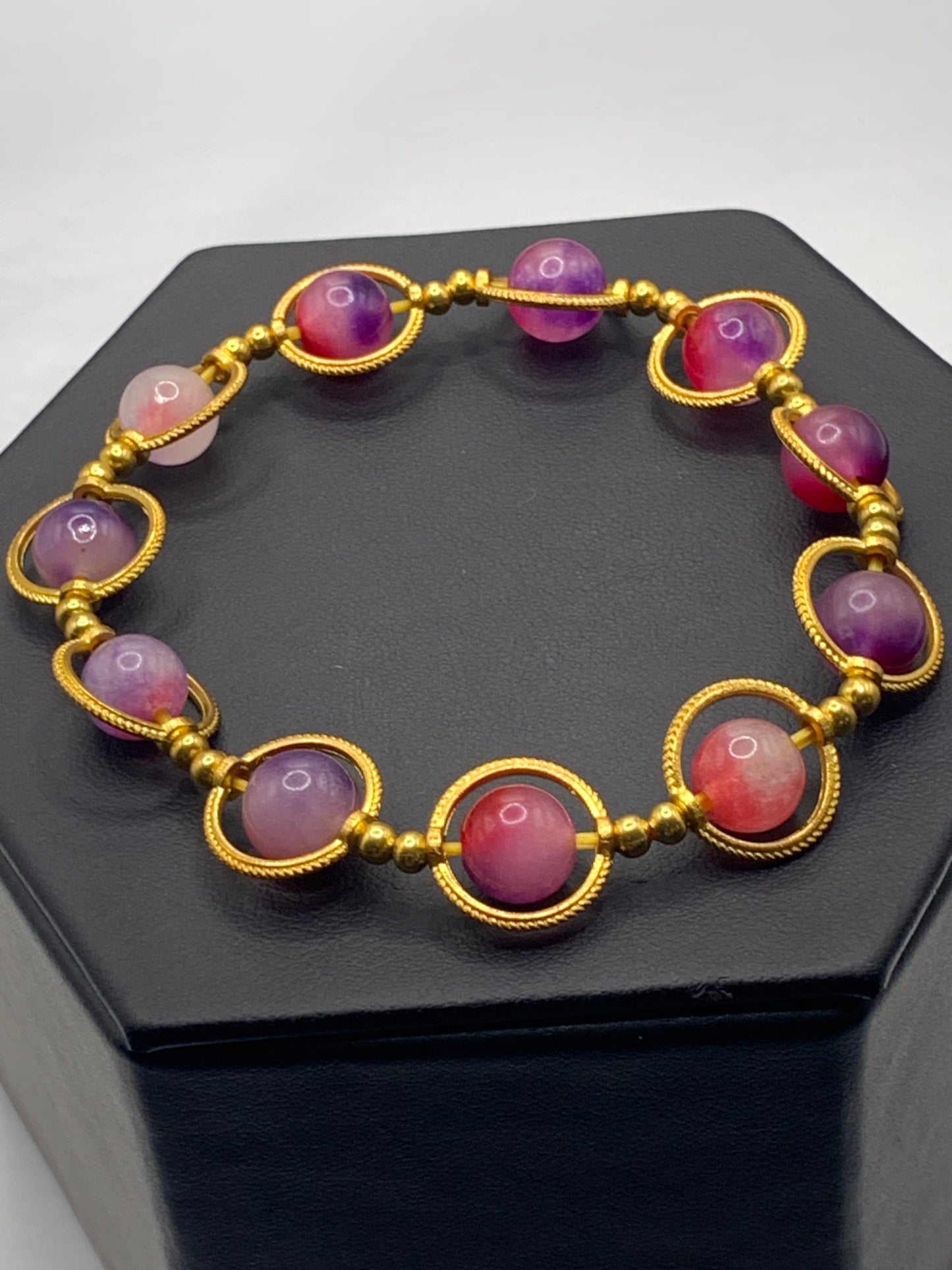 Purple pink chalcedony semi precious stone/crystal elastic beaded bracelet with gold colored rings