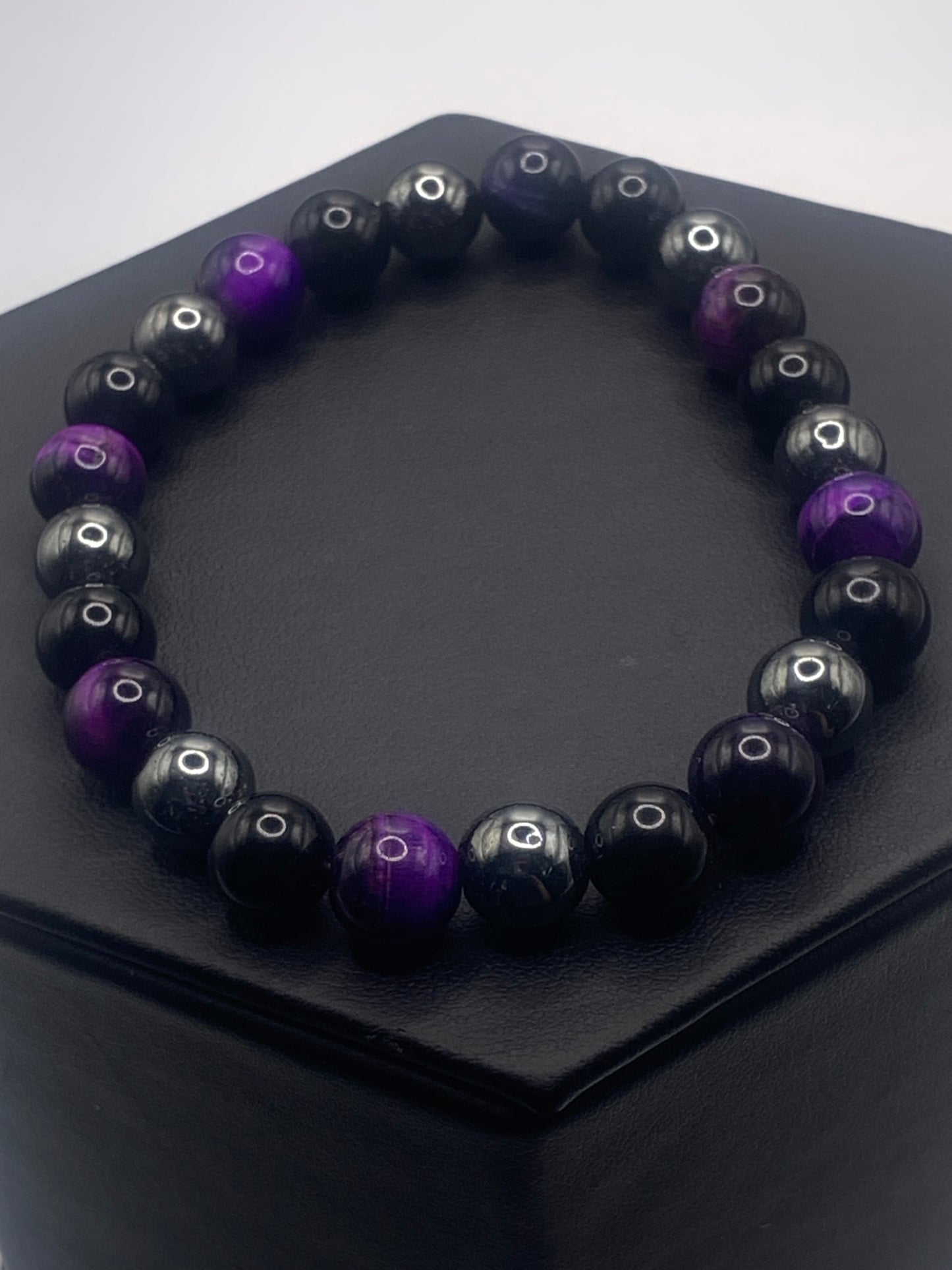 Hematite, black obsidian, and purple tigers eye semi precious stone/crystal elastic beaded bracelet