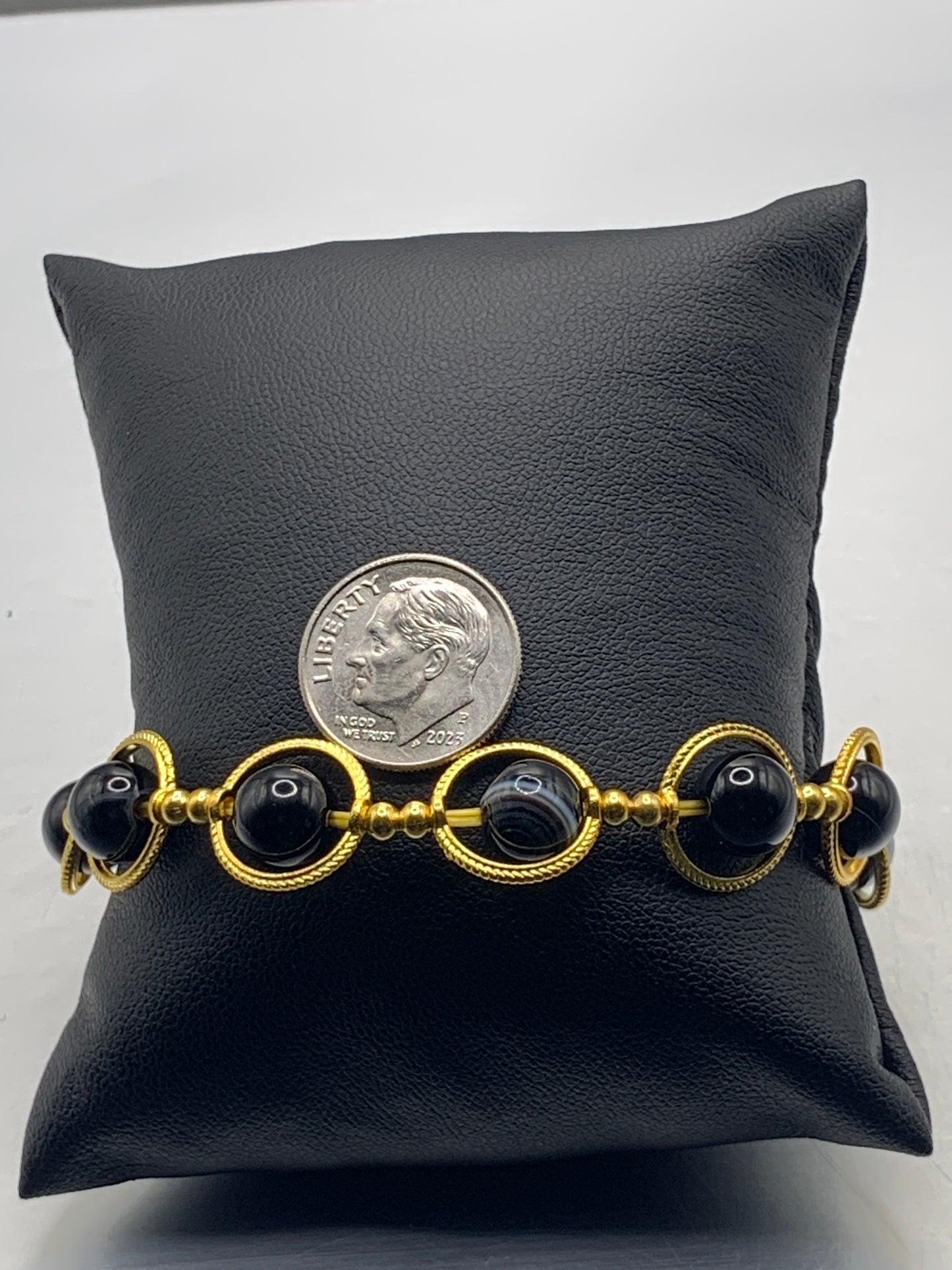 Black lace agate semi precious stone/crystal elastic beaded bracelet with gold colored rings