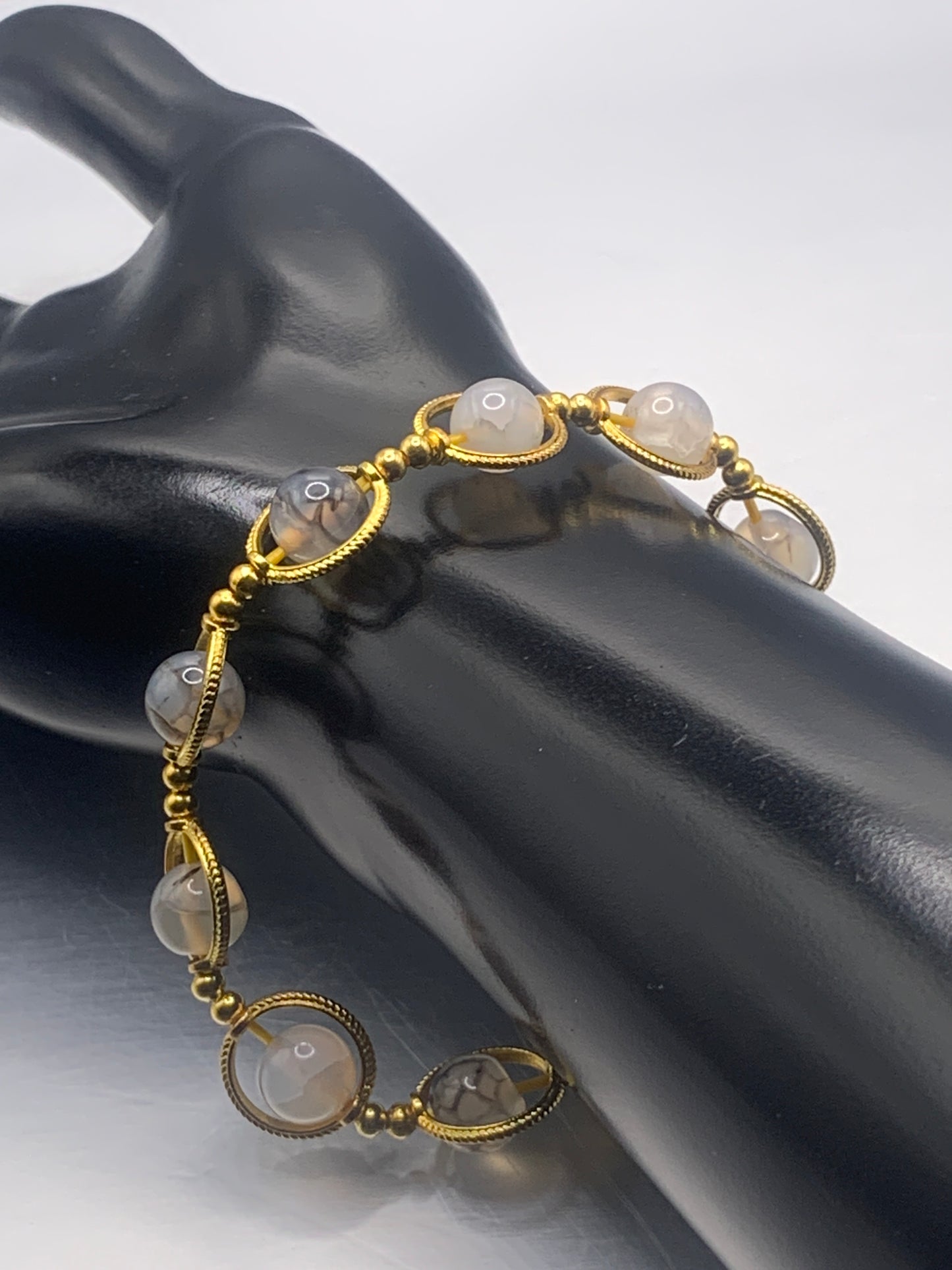 Dragon vein agate semi precious stone/crystal elastic beaded bracelet with gold colored rings