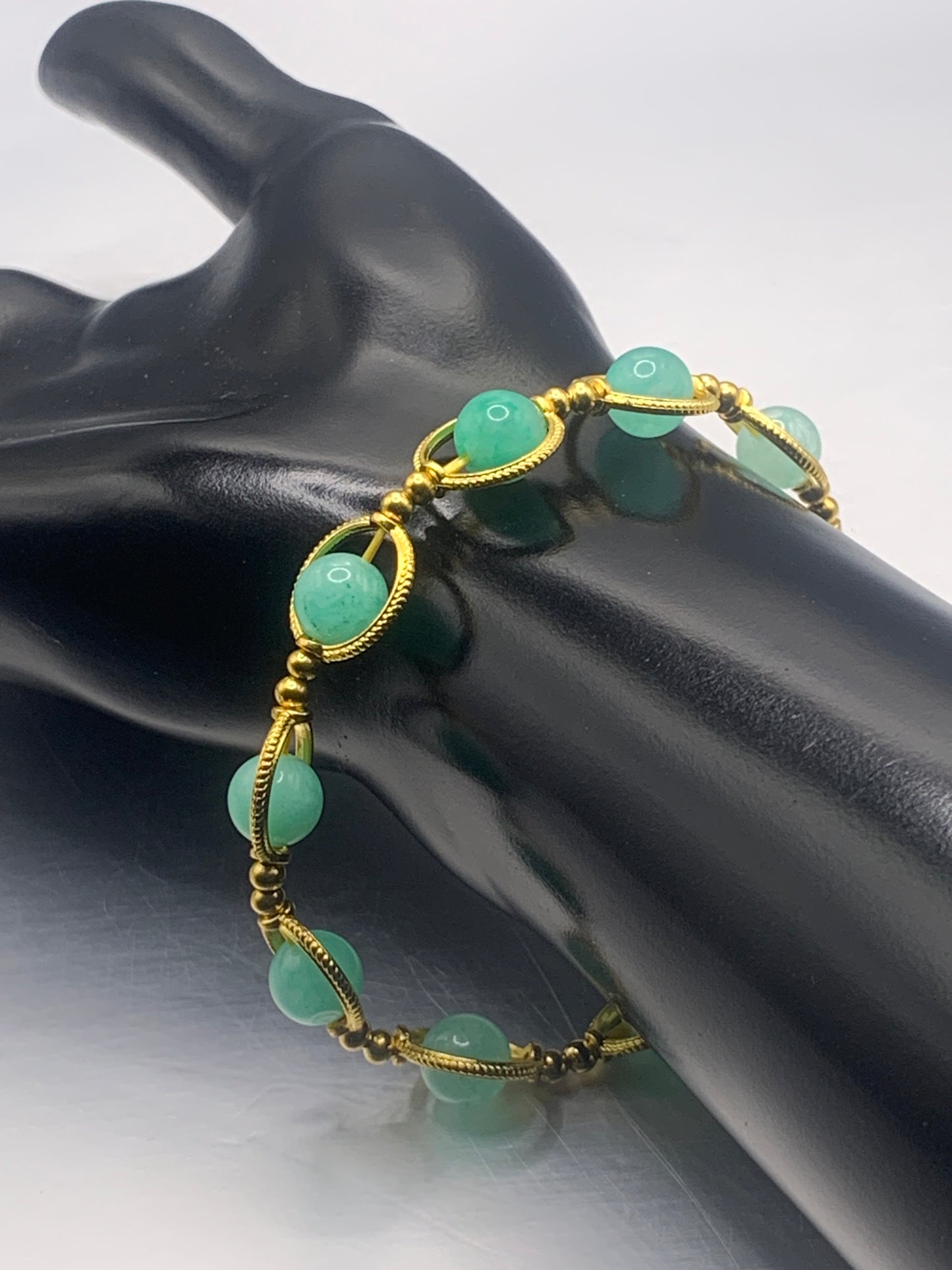 Teal chalcedony semi precious stone/crystal elastic beaded bracelet with gold colored rings