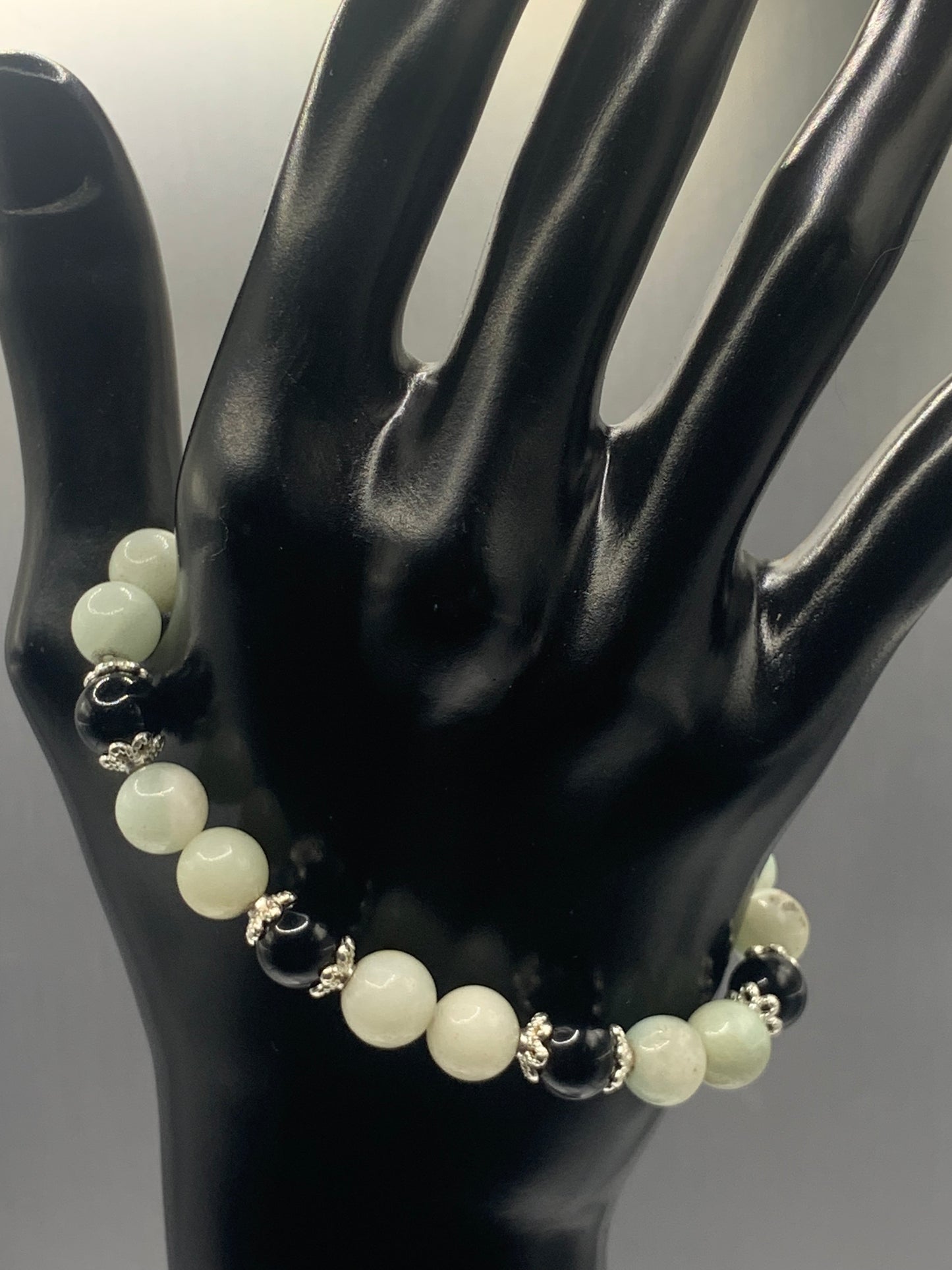 Black obsidian with amazonite semi precious stone/crystal beaded elastic bracelet with silver plated flower bead caps