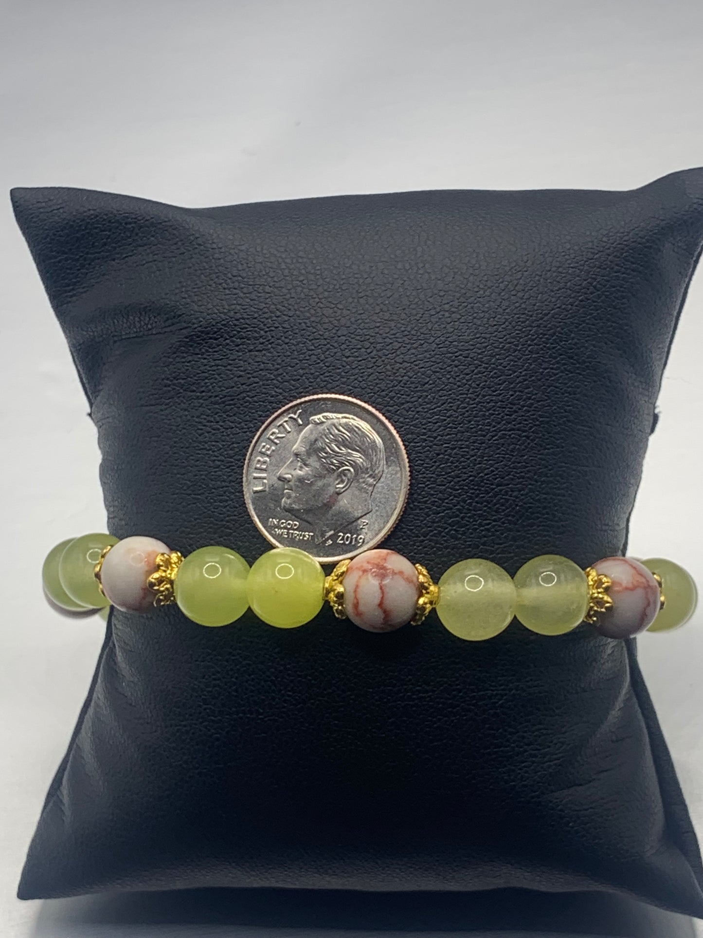 Red vein jasper and apple agate semi precious stone/crystal elastic beaded bracelet with gold plated flower bead caps