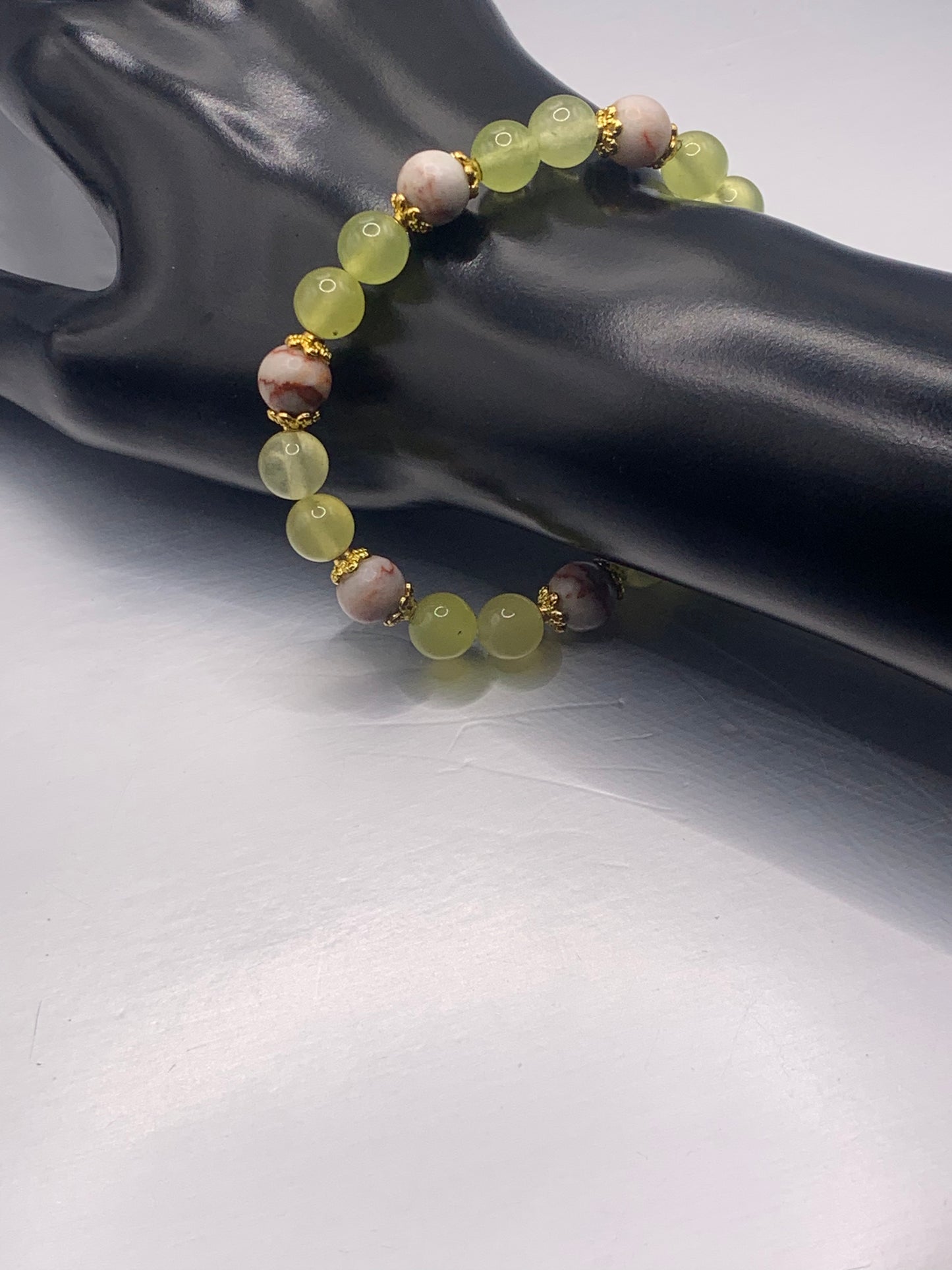 Red vein jasper and apple agate semi precious stone/crystal elastic beaded bracelet with gold plated flower bead caps