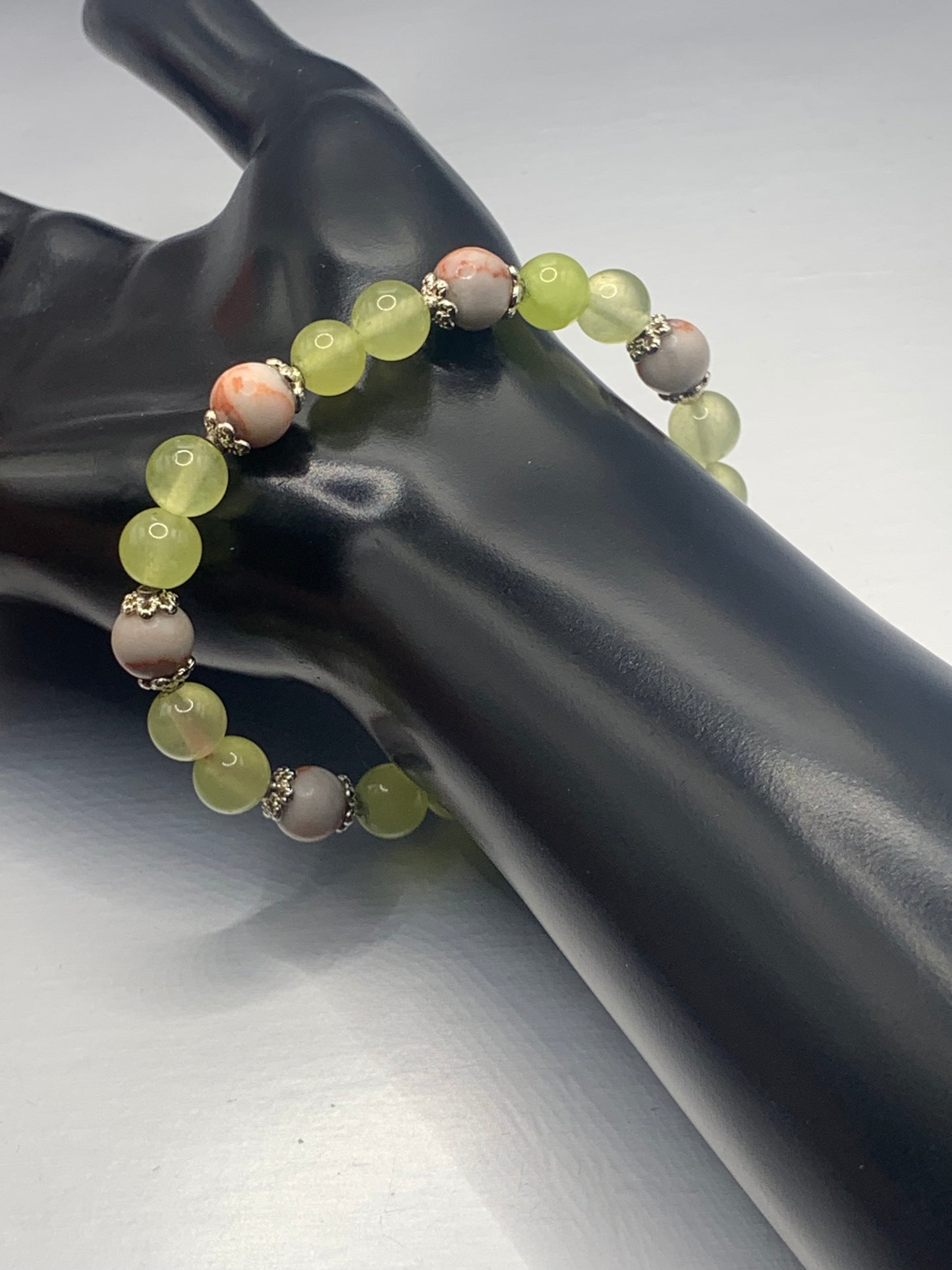 Red vein jasper and apple agate semi precious stone/crystal elastic beaded bracelet with silver plated flower bead caps