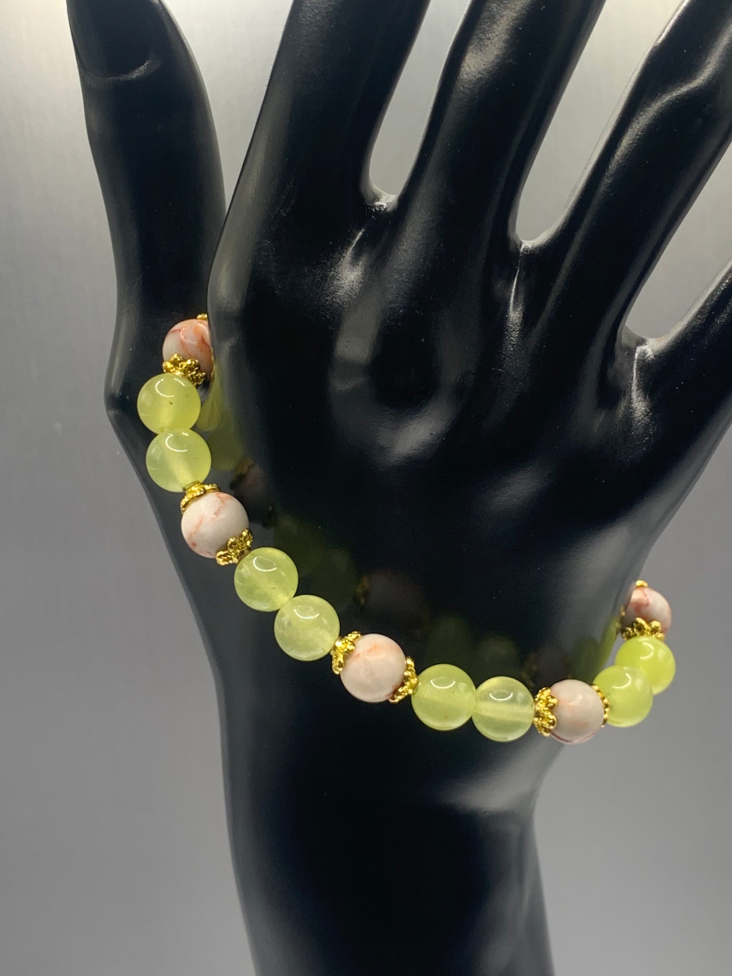 Red vein jasper and apple agate semi precious stone/crystal elastic beaded bracelet with gold plated flower bead caps
