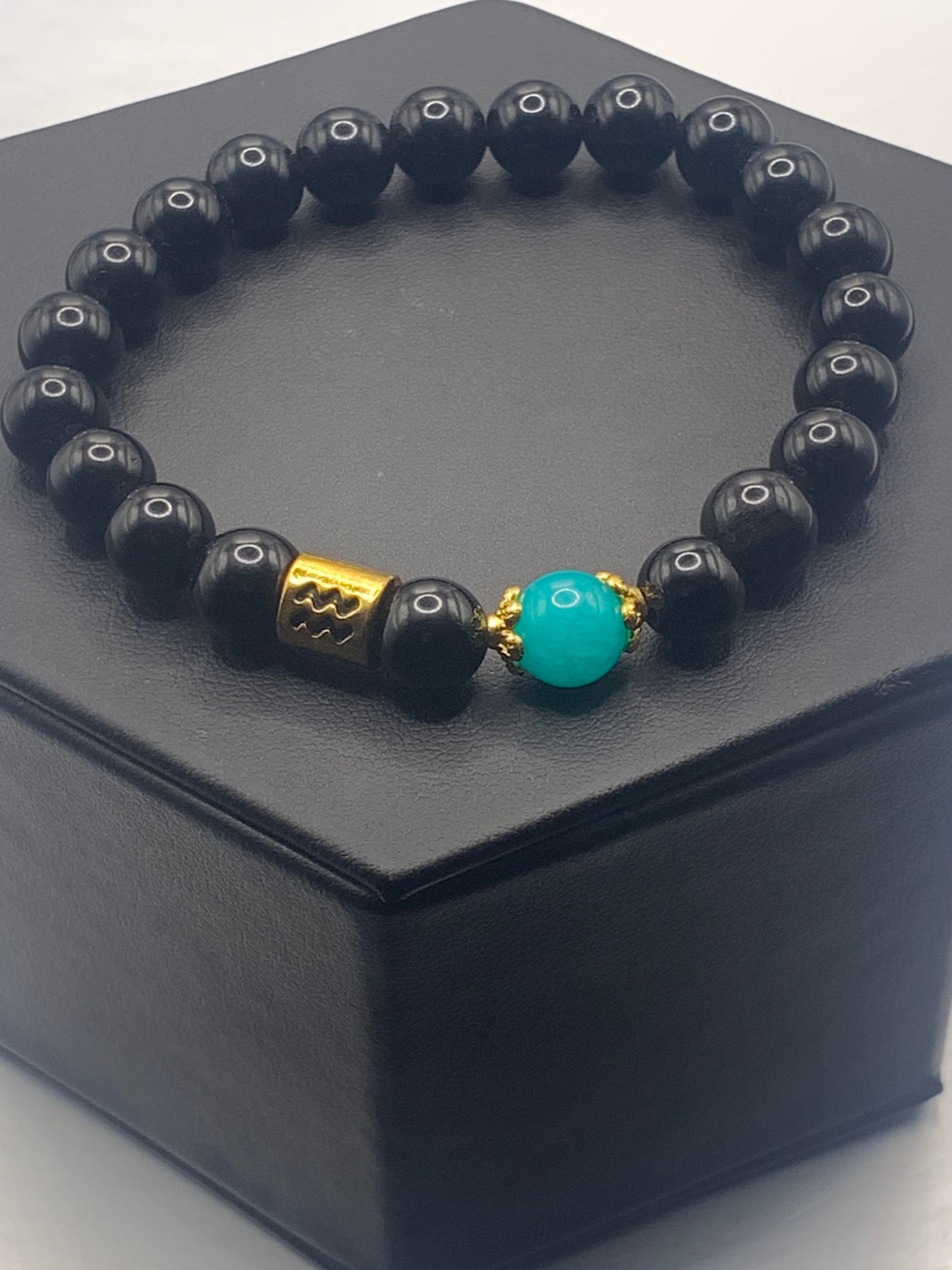 Aquarius Zodiac black obsidian with aquamarine chalcedony semi precious stone/crystal elastic beaded bracelet with gold accents