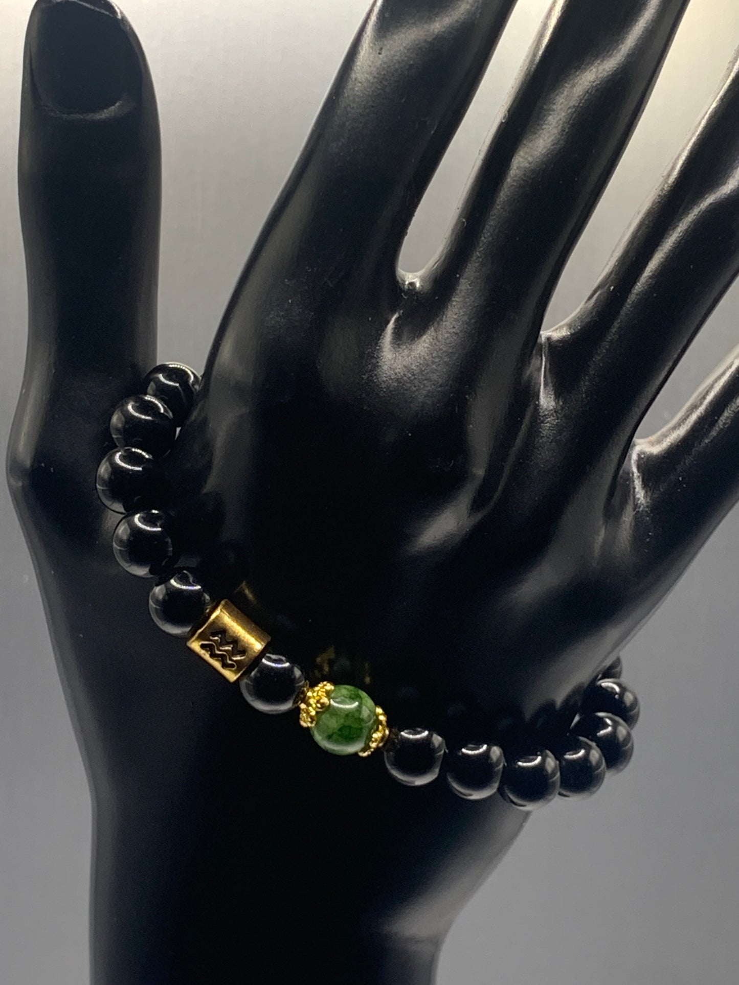 Aquarius Zodiac black obsidian with green tourmaline semi precious stone/crystal elastic beaded bracelet with gold accents