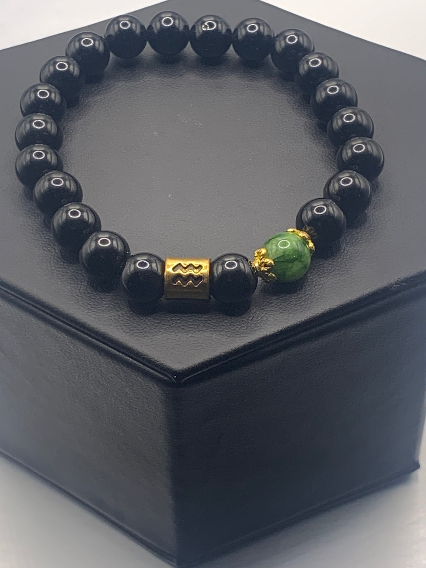 Aquarius Zodiac black obsidian with green tourmaline semi precious stone/crystal elastic beaded bracelet with gold accents