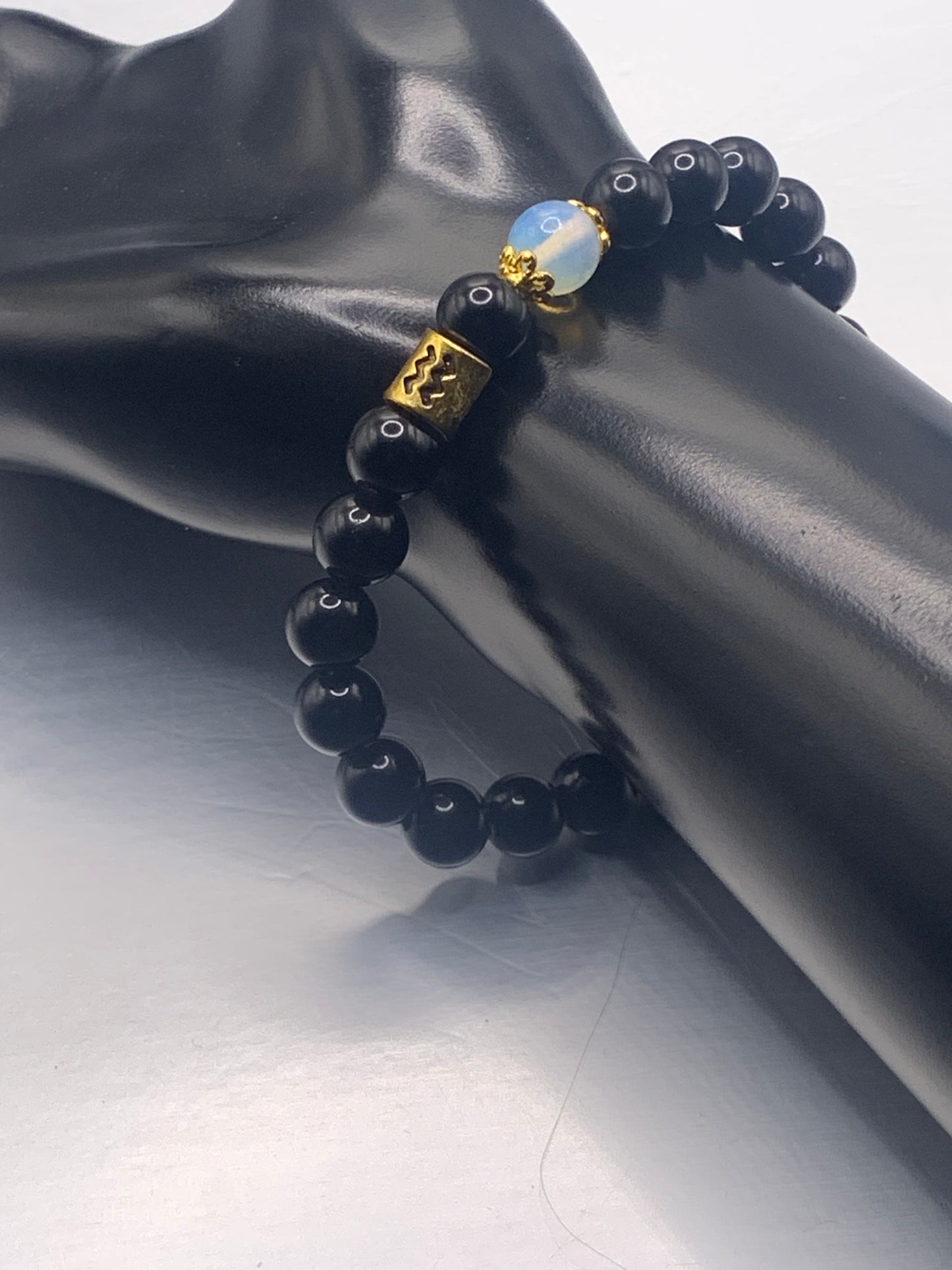 Aquarius Zodiac black obsidian with opalite semi precious stone/crystal elastic beaded bracelet with gold accents