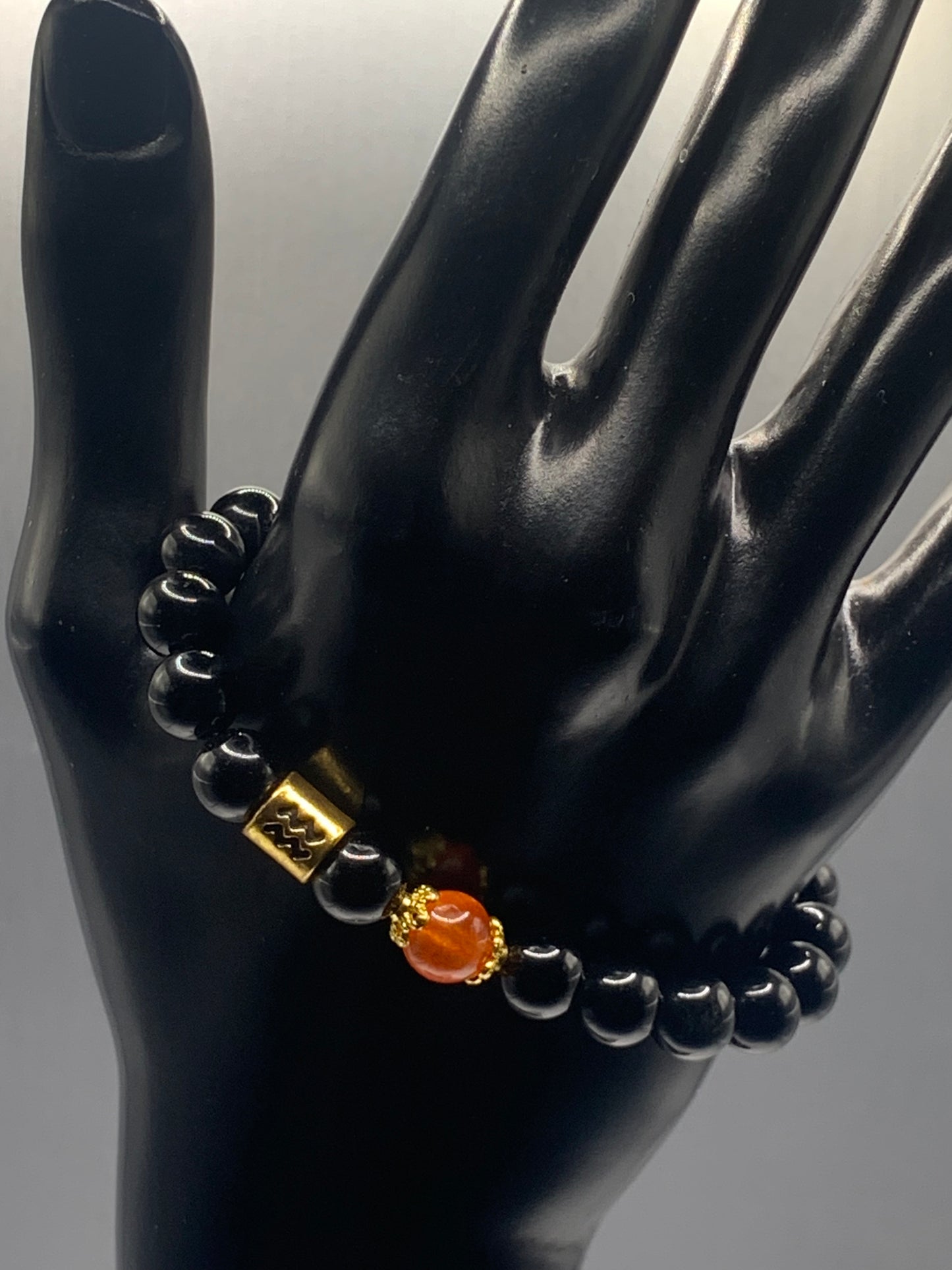Aquarius Zodiac black obsidian with phoenix agate semi precious stone/crystal elastic beaded bracelet with gold accents