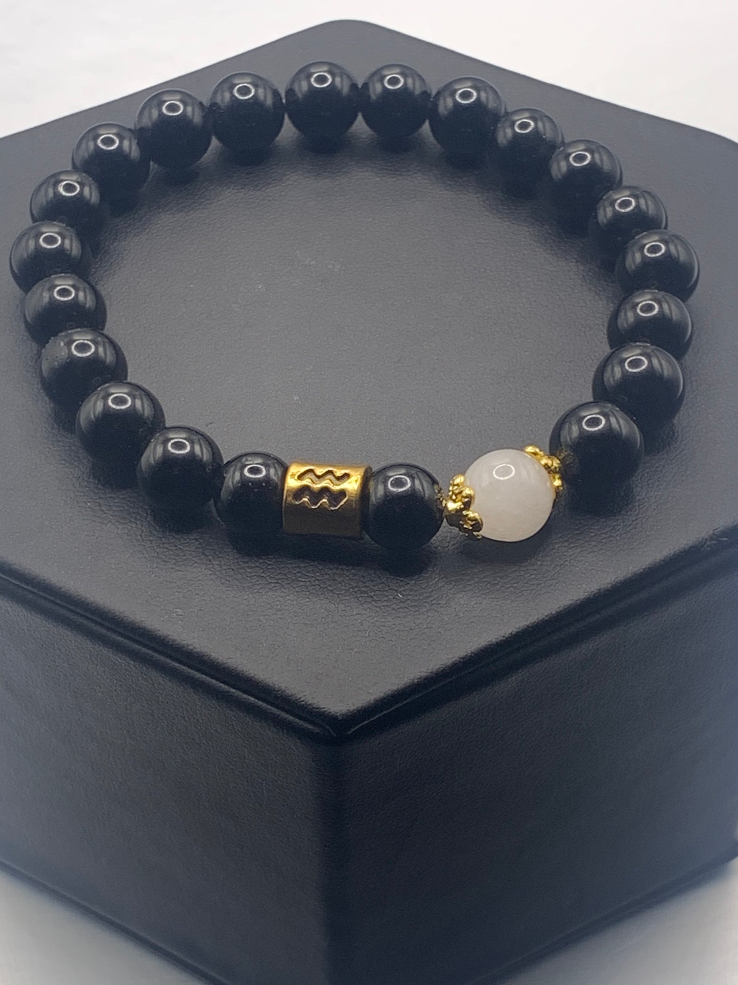 Aquarius Zodiac black obsidian with white chalcedony semi precious stone/crystal elastic beaded bracelet with gold accents