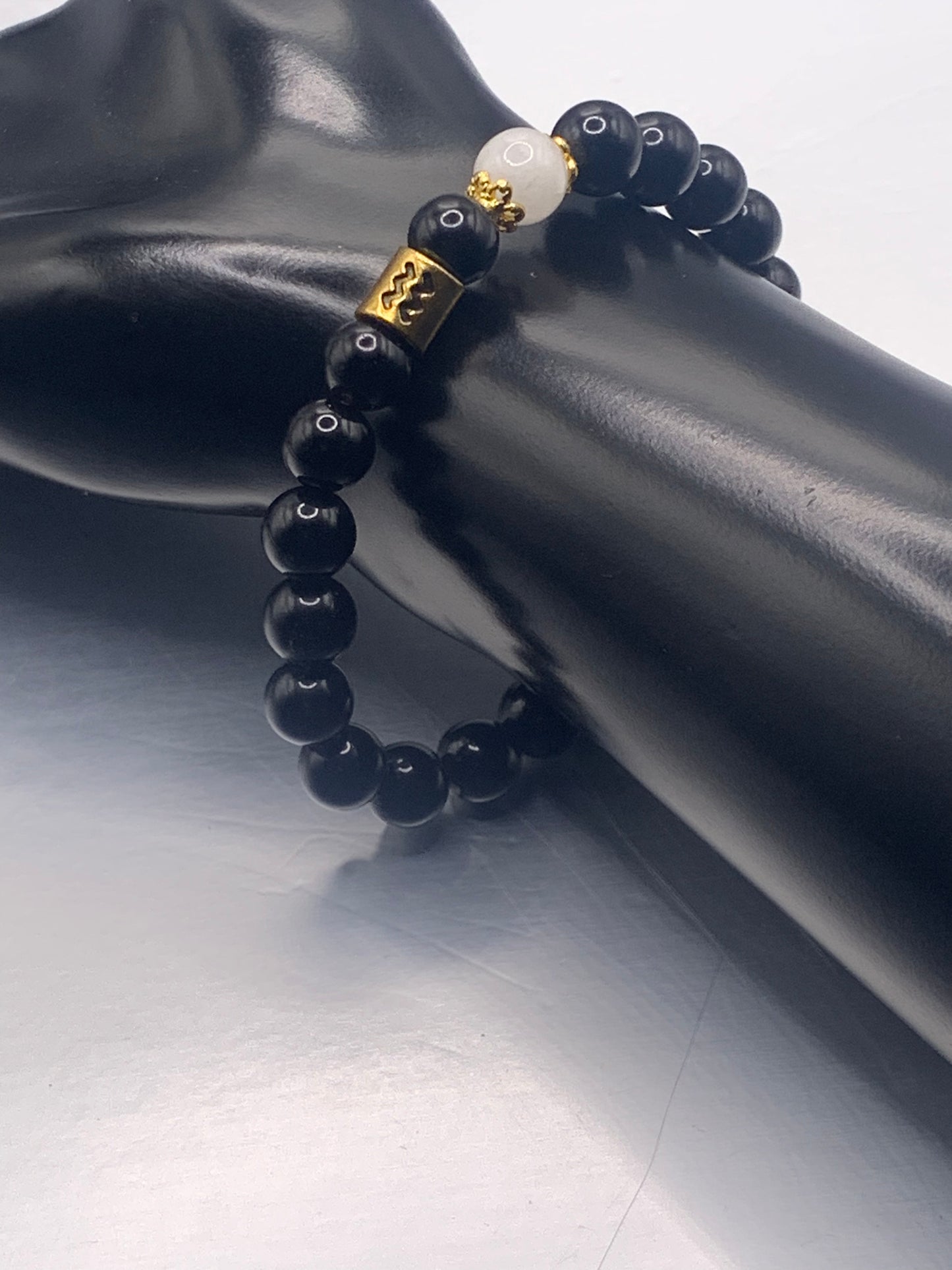 Aquarius Zodiac black obsidian with white chalcedony semi precious stone/crystal elastic beaded bracelet with gold accents