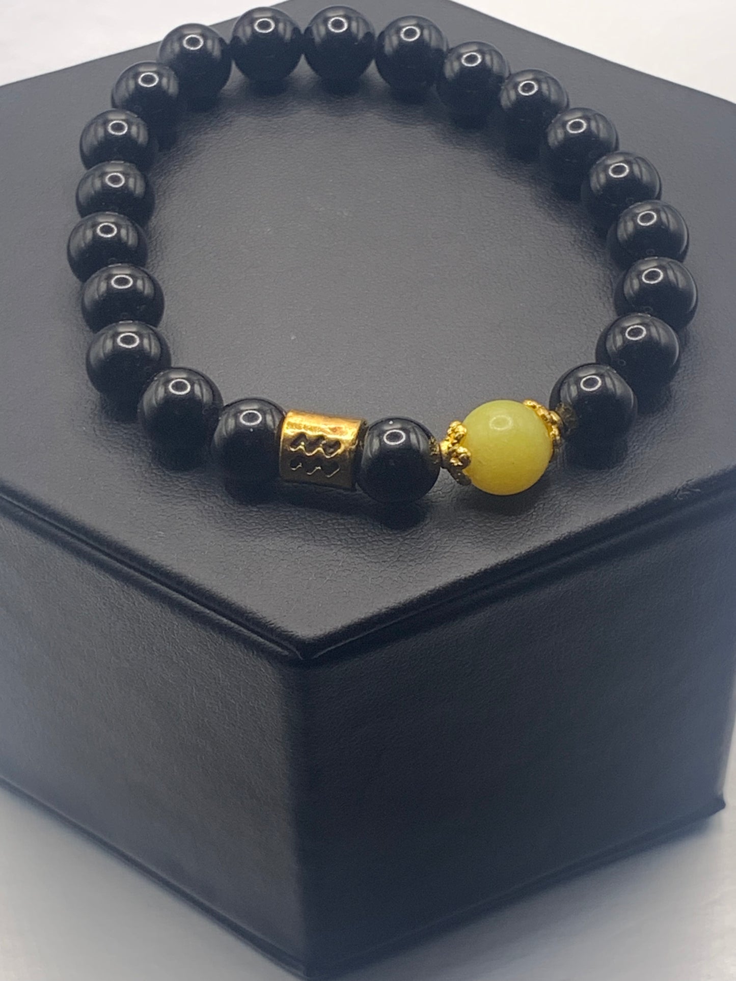Aquarius Zodiac black obsidian with yellow jade semi precious stone/crystal elastic beaded bracelet with gold accents