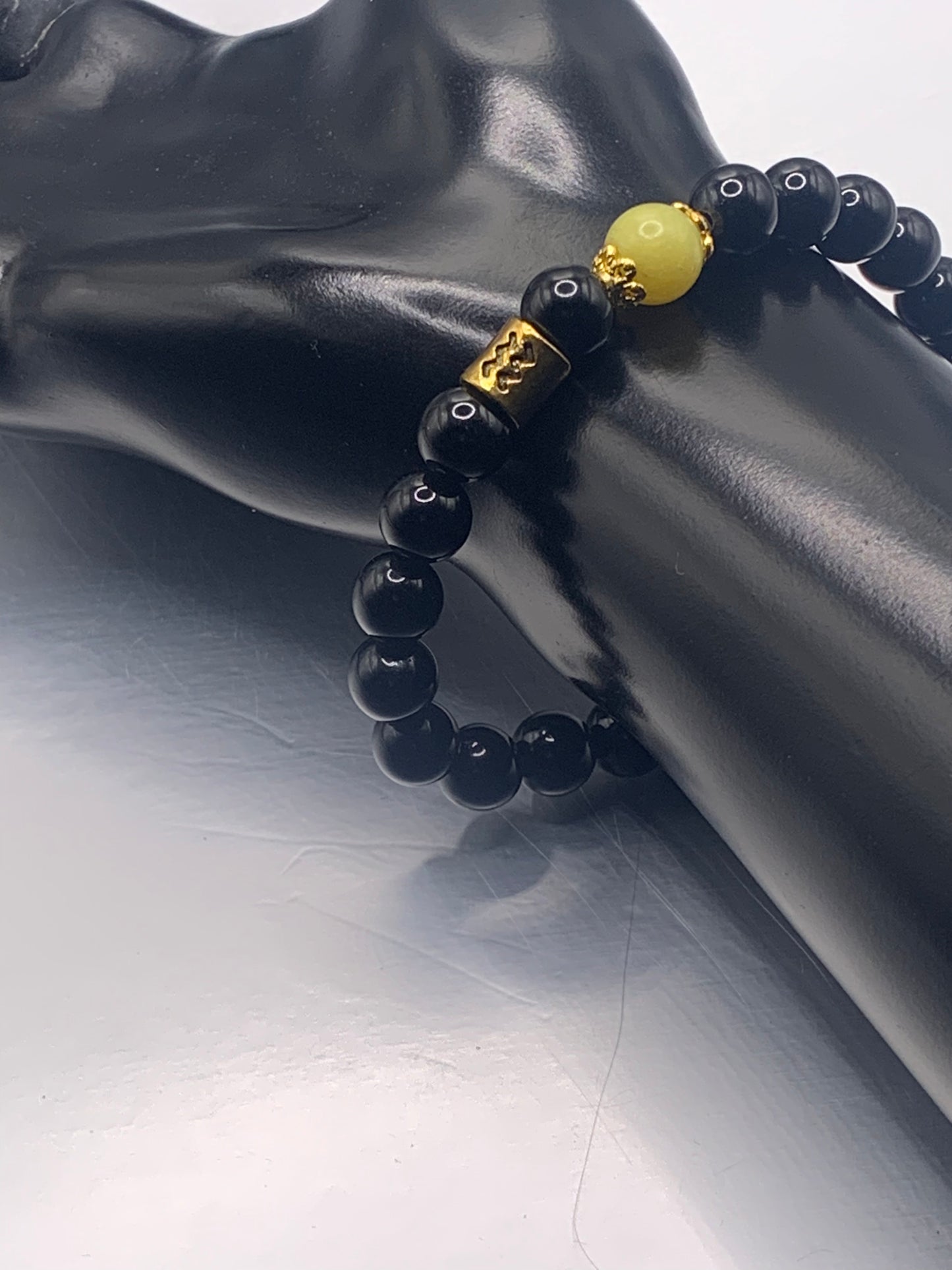 Aquarius Zodiac black obsidian with yellow jade semi precious stone/crystal elastic beaded bracelet with gold accents