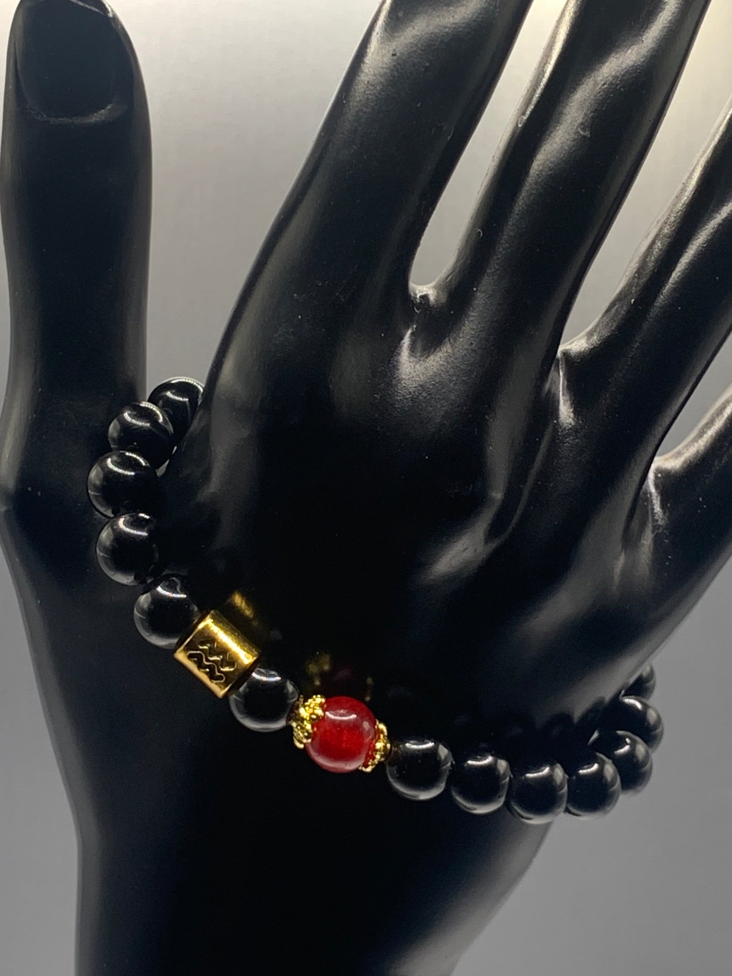 Aquarius Zodiac black obsidian with red chalcedony semi precious stone/crystal elastic beaded bracelet with gold accents