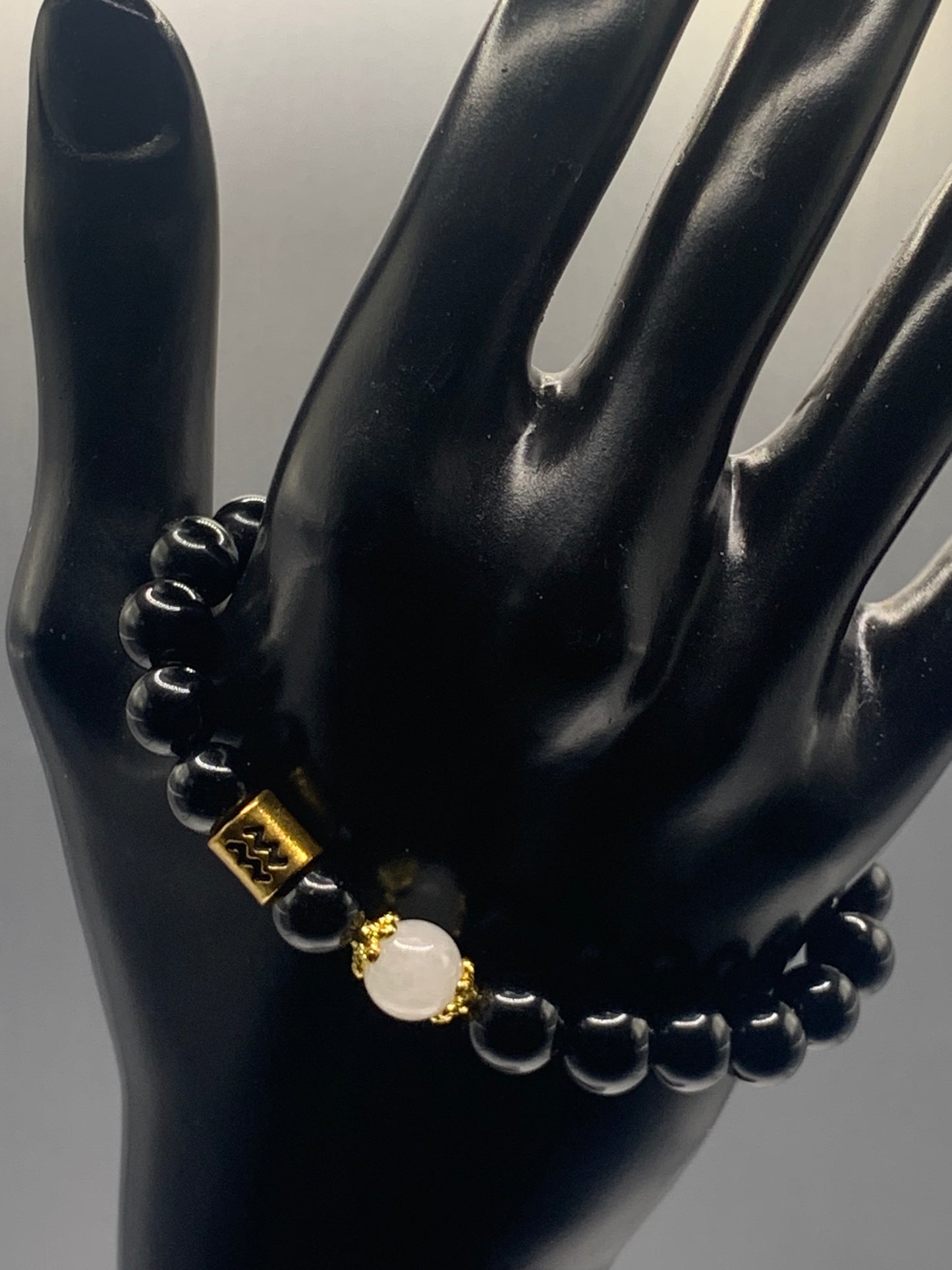 Aquarius Zodiac black obsidian with white chalcedony semi precious stone/crystal elastic beaded bracelet with gold accents