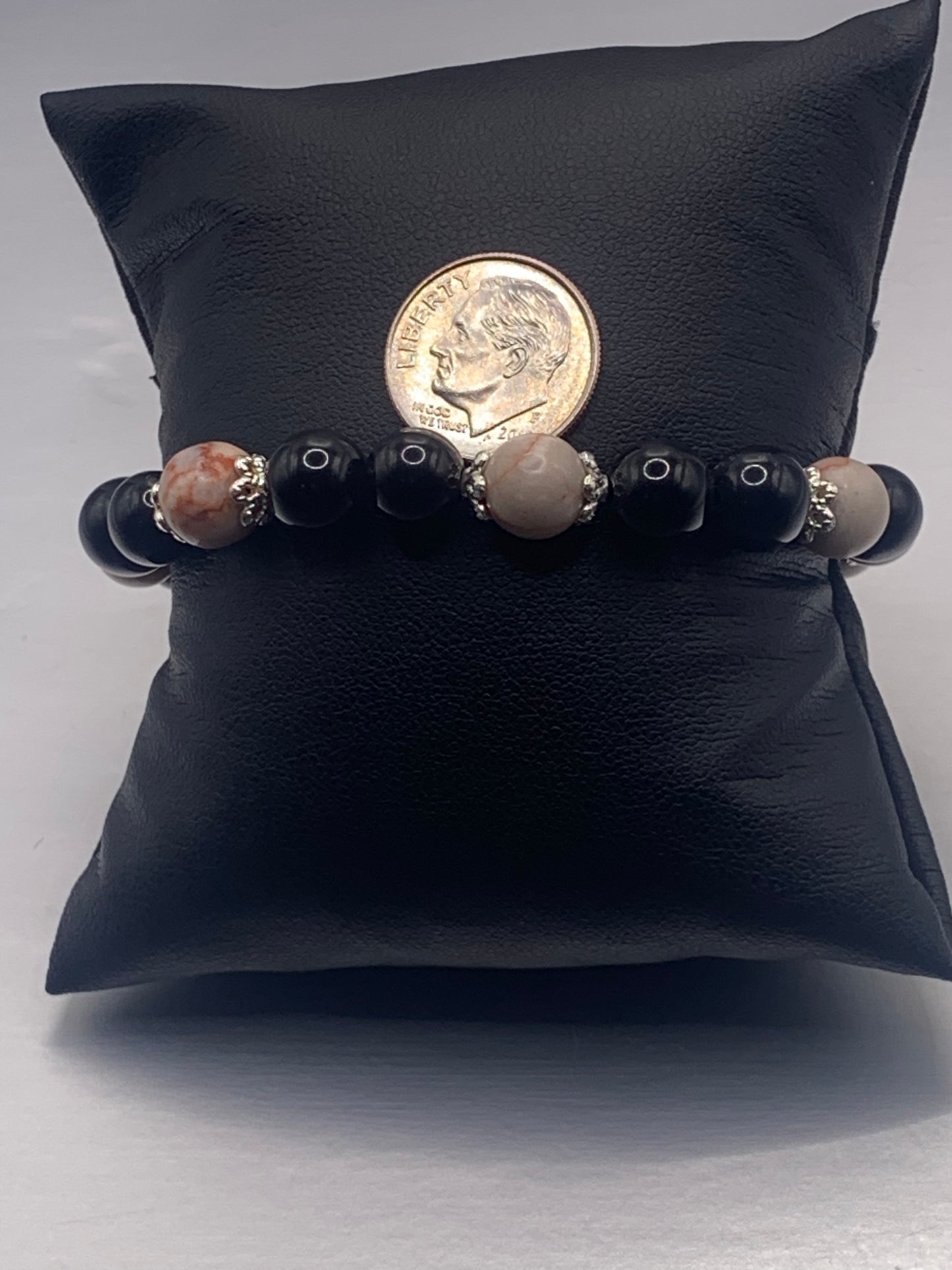 Red vein jasper and black obsidian semi precious stone/crystal elastic beaded bracelet with silver plated flower bead caps
