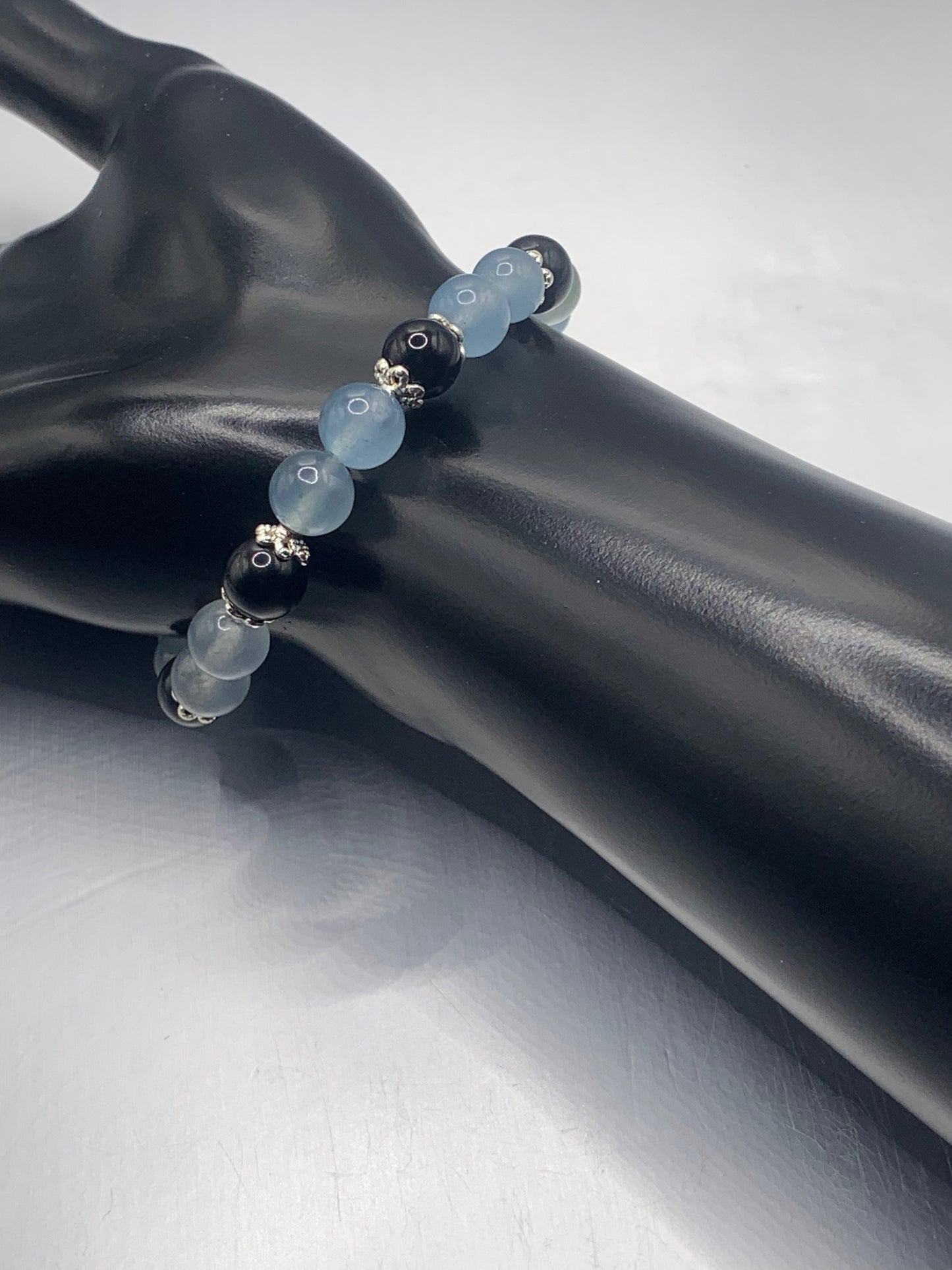 Black obsidian with blue agate semi precious stone/crystal beaded elastic bracelet with silver plated flower bead caps