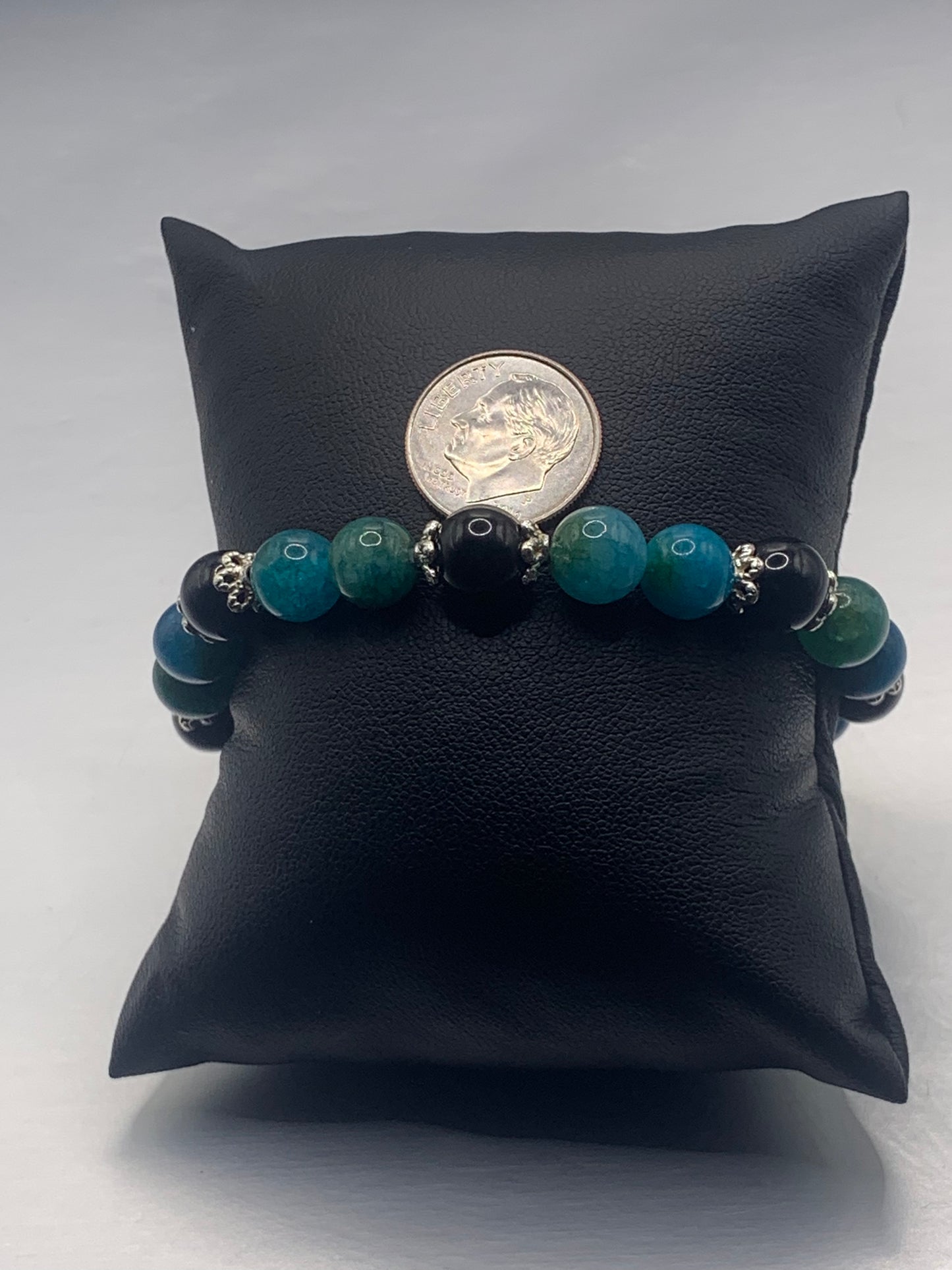 Black obsidian with blue apatite semi precious stone/crystal beaded elastic bracelet with silver plated flower bead caps
