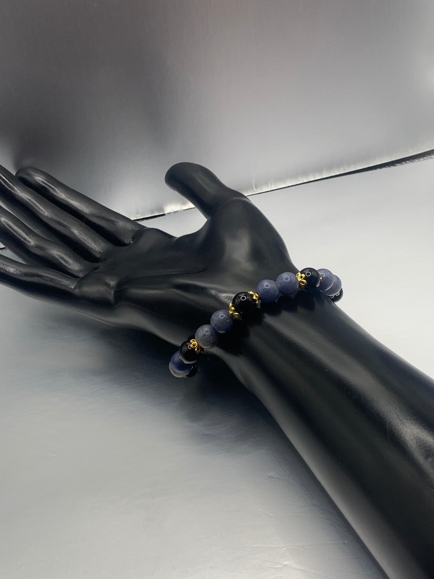 Black obsidian with blue aventurine semi precious stone/crystal beaded elastic bracelet with gold plated flower bead caps
