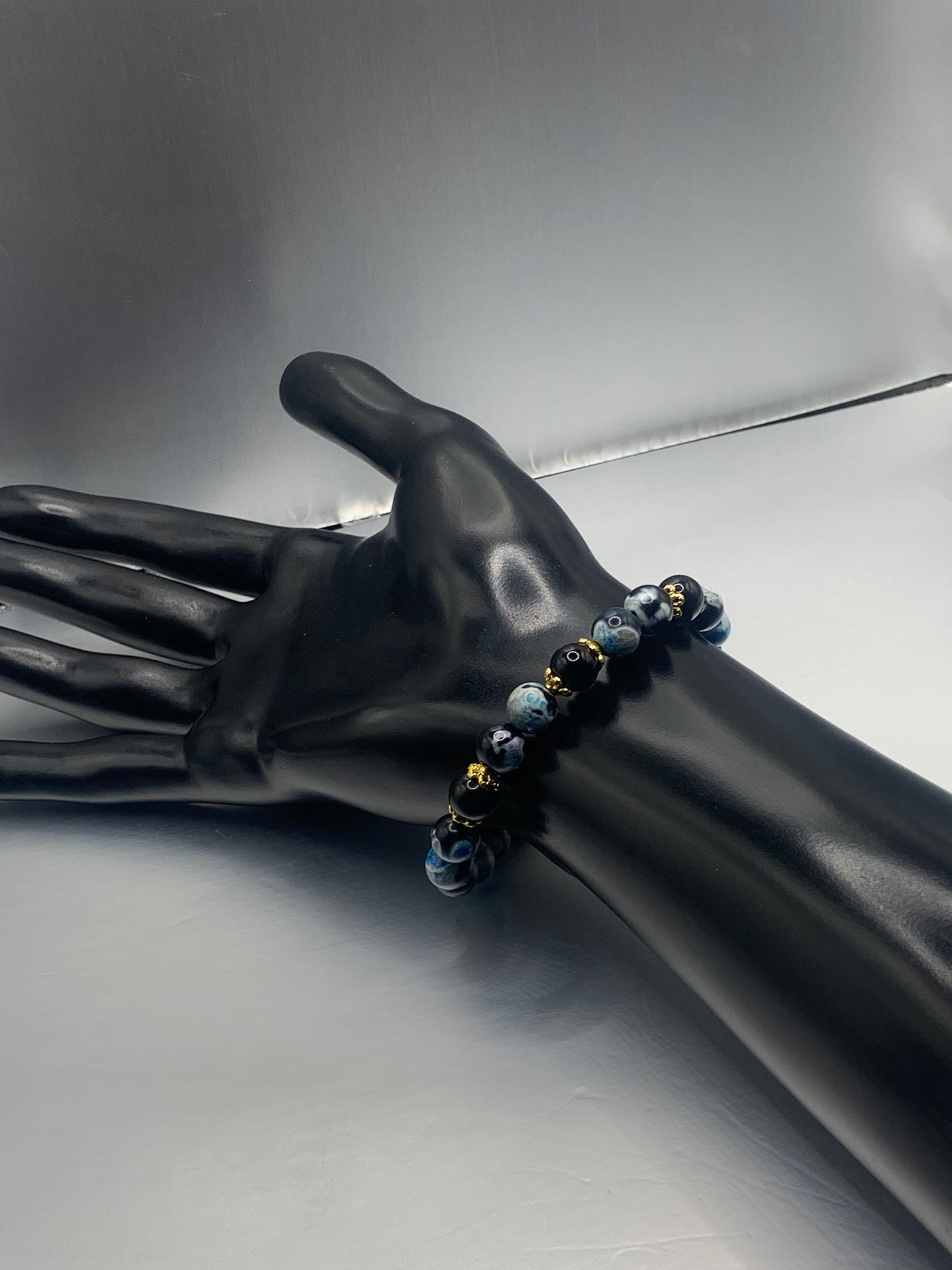 Black obsidian with blue orca agate semi precious stone/crystal beaded elastic bracelet with gold plated flower bead caps