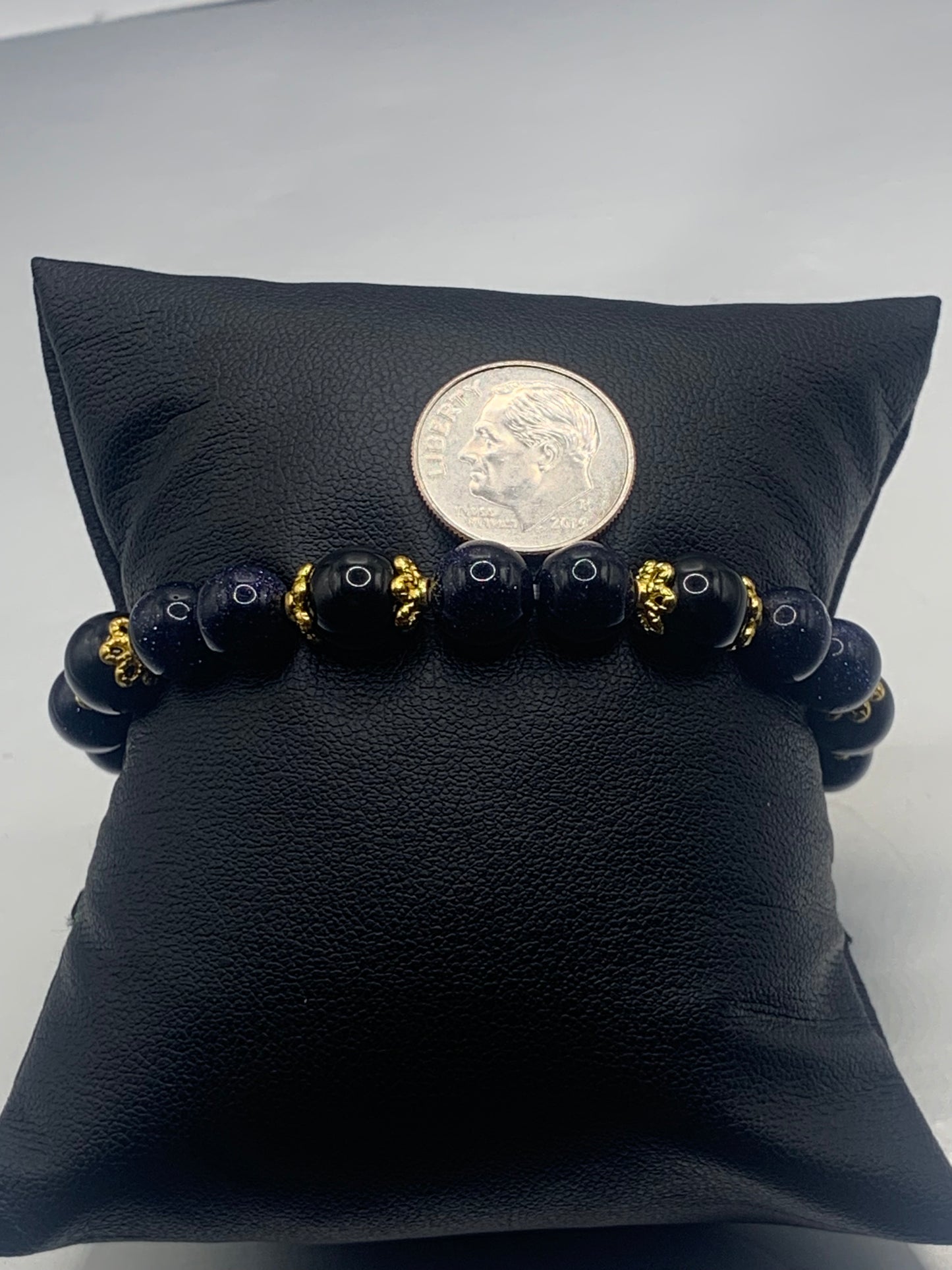 Black obsidian with blue sandstone semi precious stone/crystal beaded elastic bracelet with gold plated flower bead caps