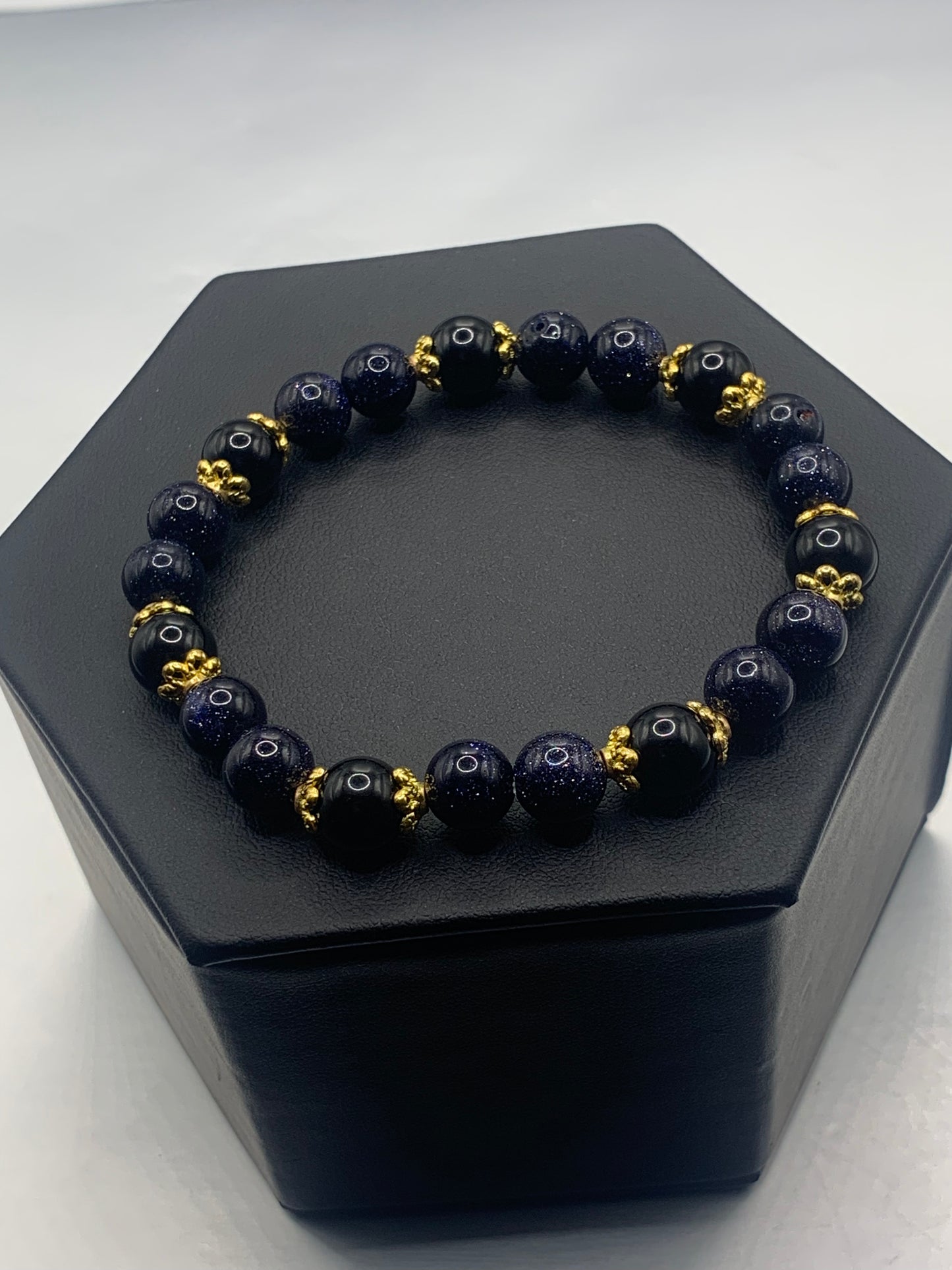 Black obsidian with blue sandstone semi precious stone/crystal beaded elastic bracelet with gold plated flower bead caps