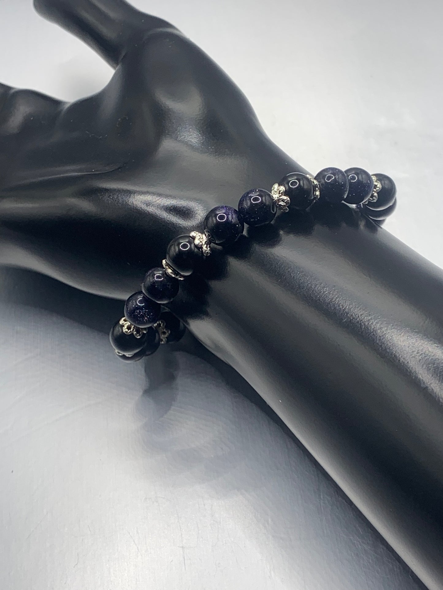 Black obsidian with blue sandstone semi precious stone/crystal beaded elastic bracelet with silver plated flower bead caps