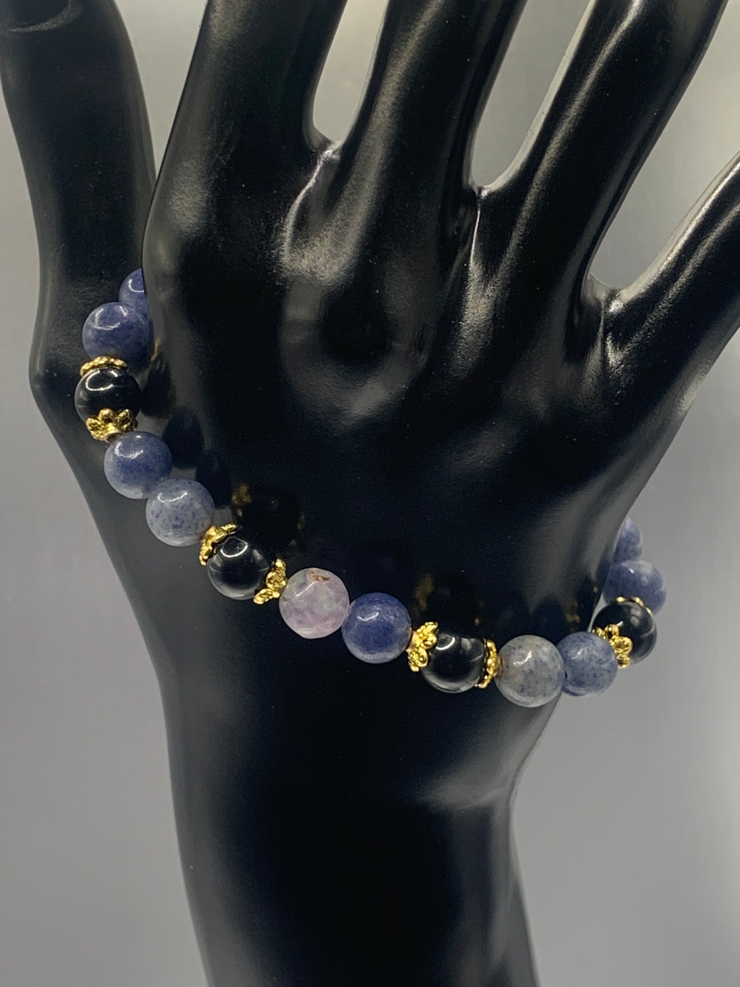 Black obsidian with blue aventurine semi precious stone/crystal beaded elastic bracelet with gold plated flower bead caps