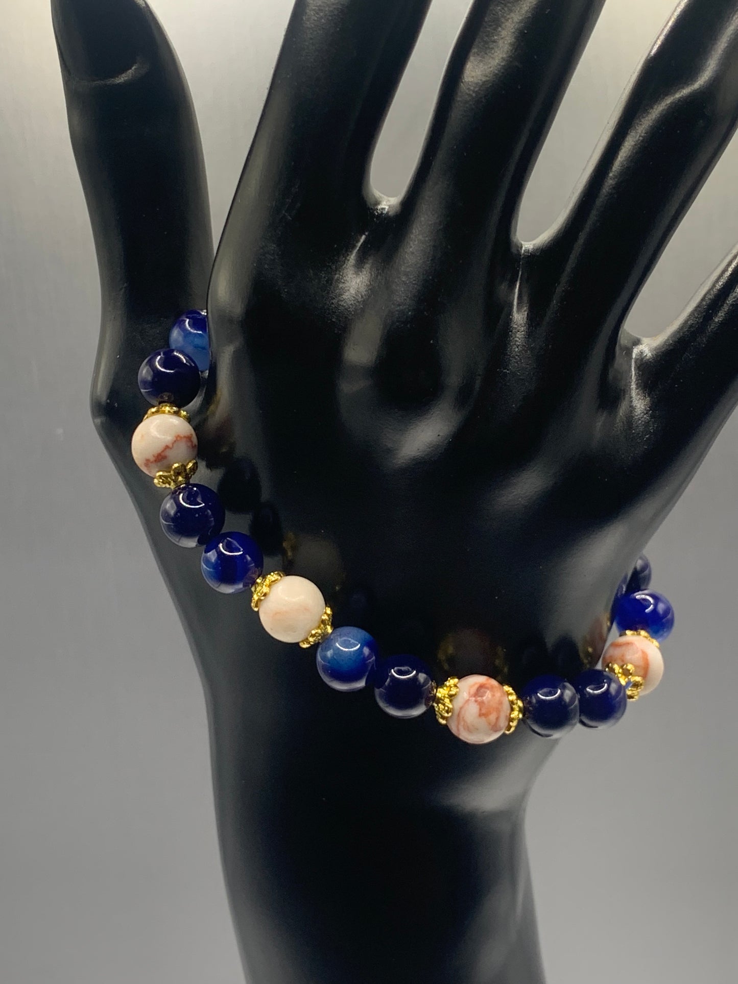 Red vein jasper and blue lace agate semi precious stone/crystal elastic beaded bracelet with gold plated flower bead caps