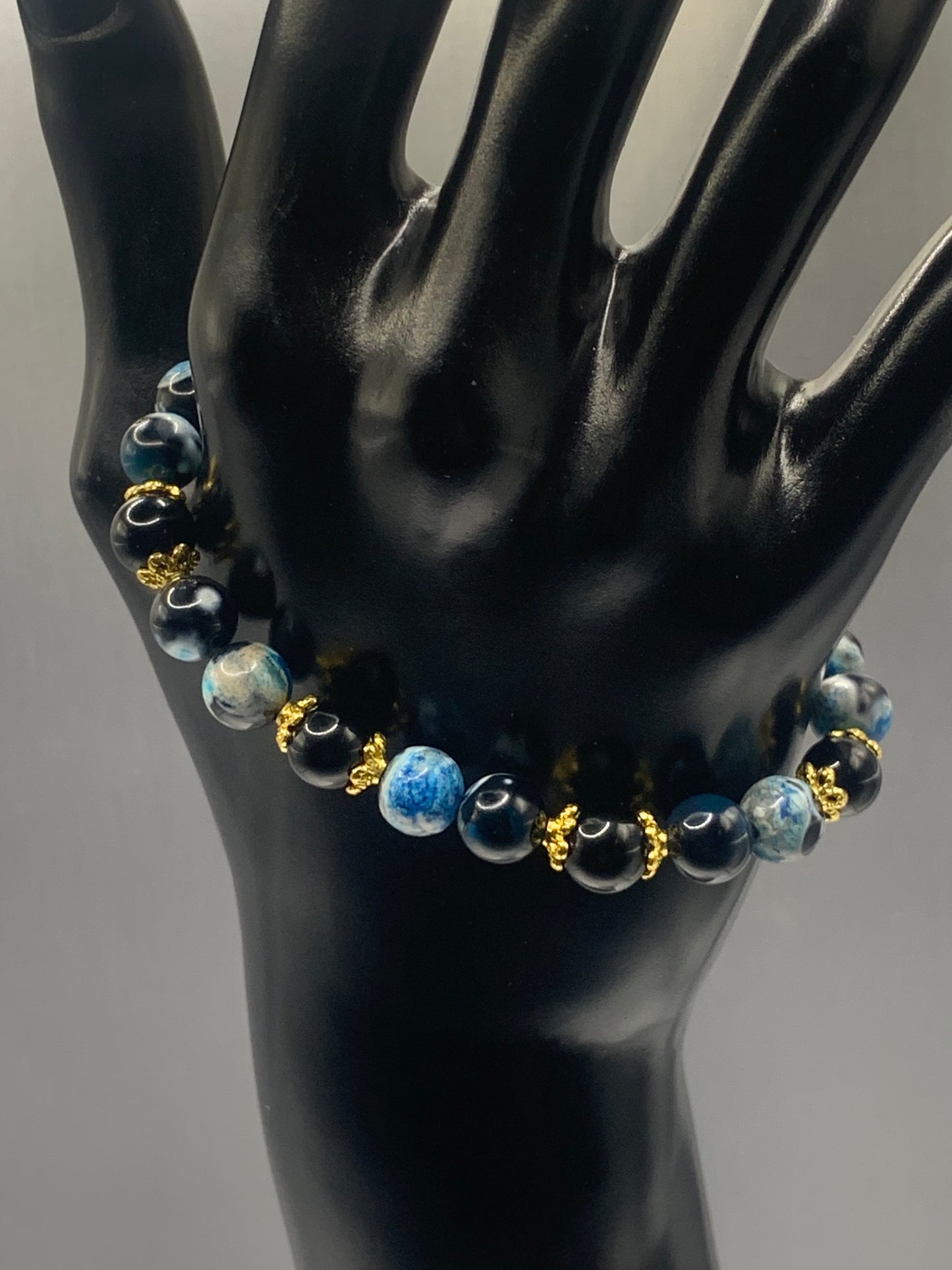 Black obsidian with blue orca agate semi precious stone/crystal beaded elastic bracelet with gold plated flower bead caps