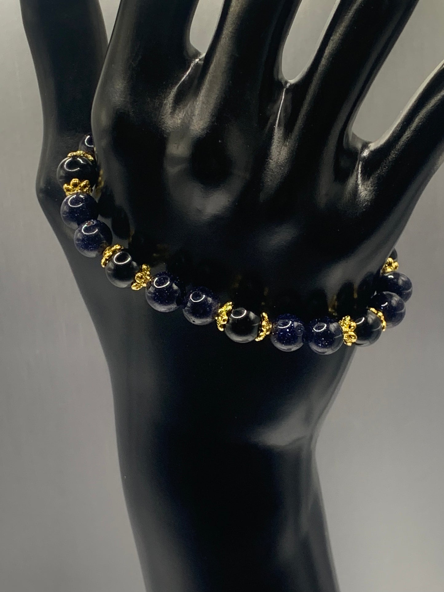 Black obsidian with blue sandstone semi precious stone/crystal beaded elastic bracelet with gold plated flower bead caps