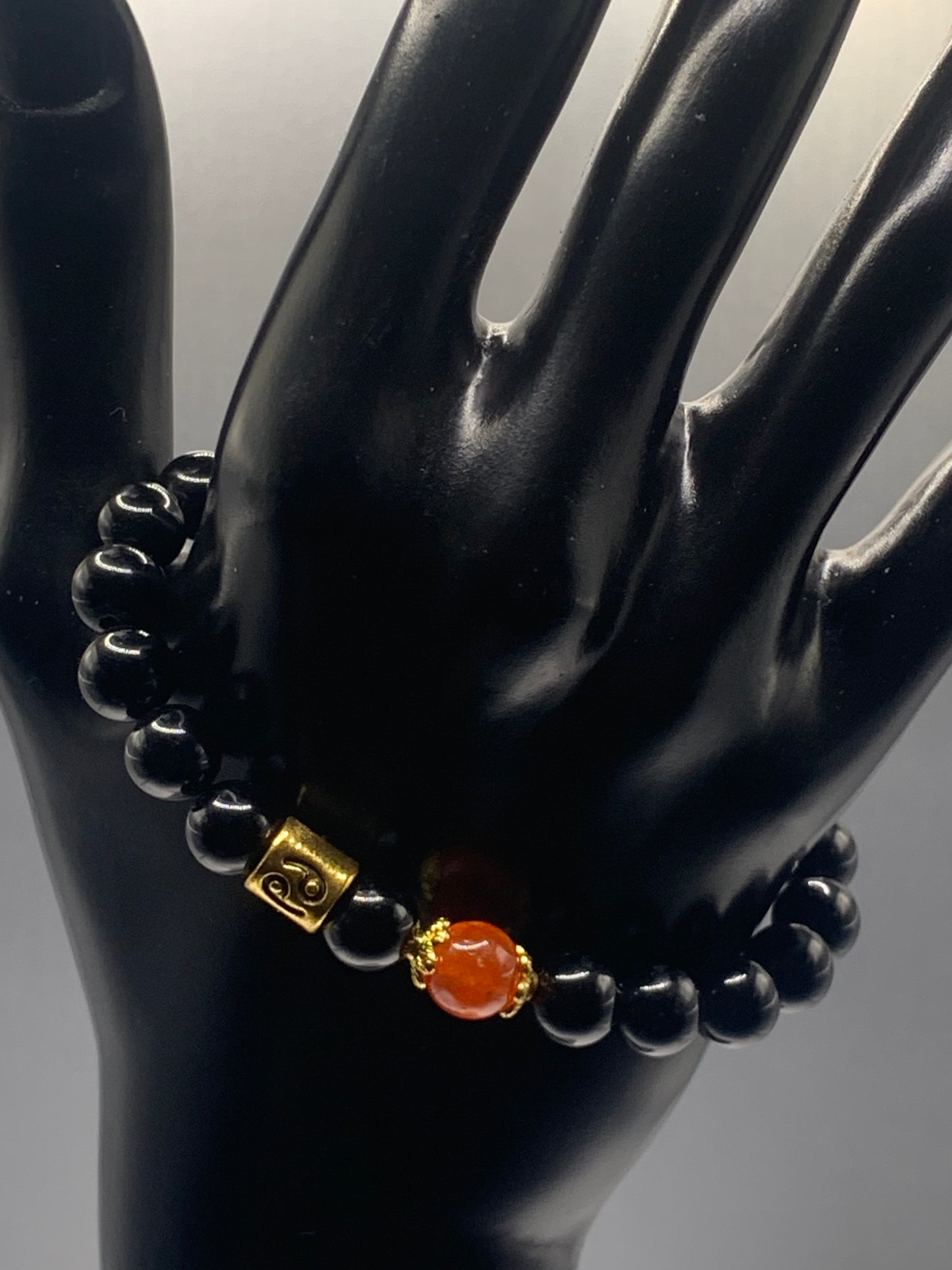 Cancer Zodiac black obsidian with phoenix agate semi precious stone/crystal elastic beaded bracelet with gold accents