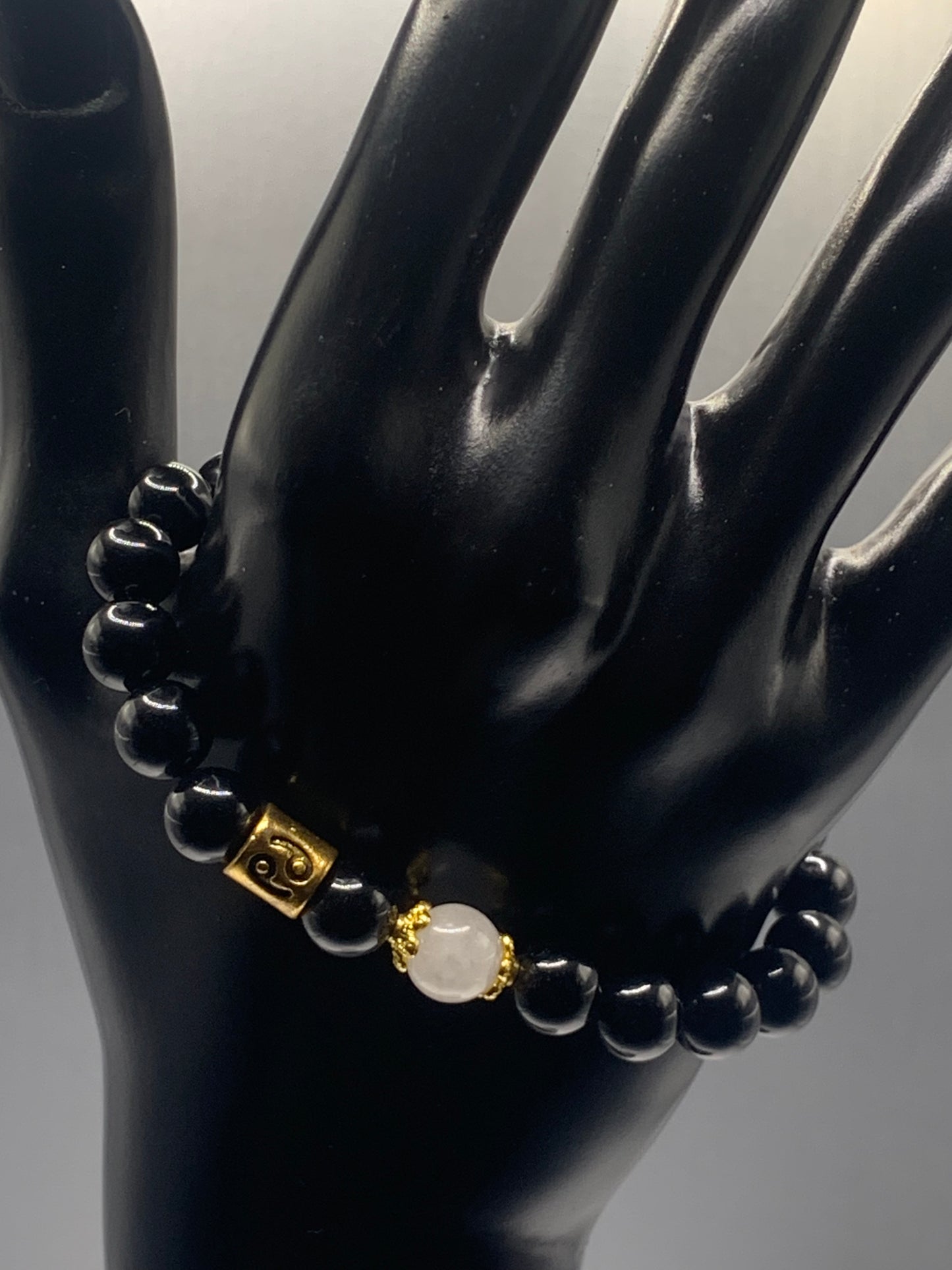 Cancer Zodiac black obsidian with white chalcedony semi precious stone/crystal elastic beaded bracelet with gold accents