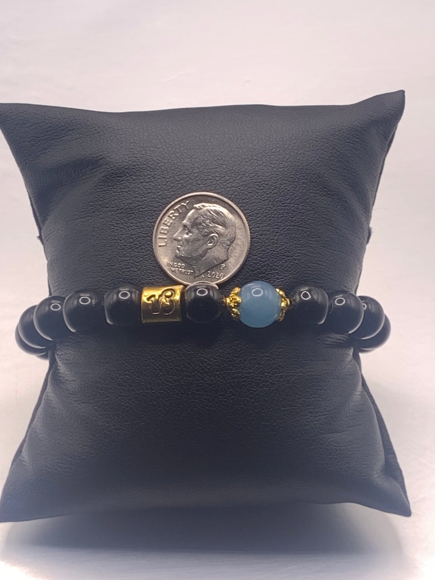 Capricorn Zodiac black obsidian with blue agate elastic beaded bracelet with gold accents