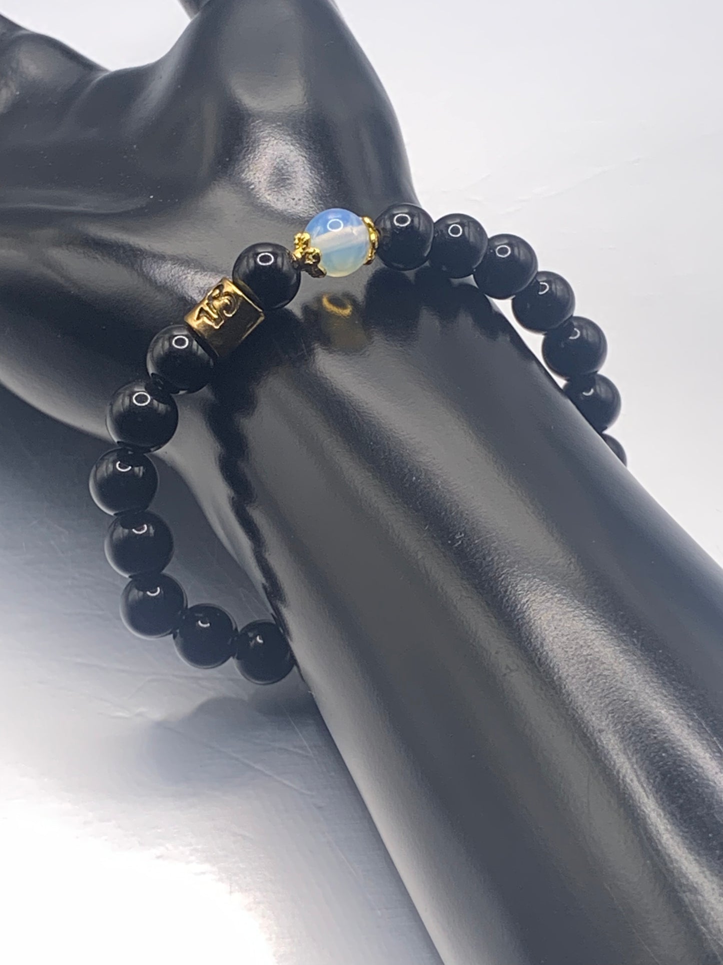 Capricorn Zodiac black obsidian with opalite elastic beaded bracelet with gold accents