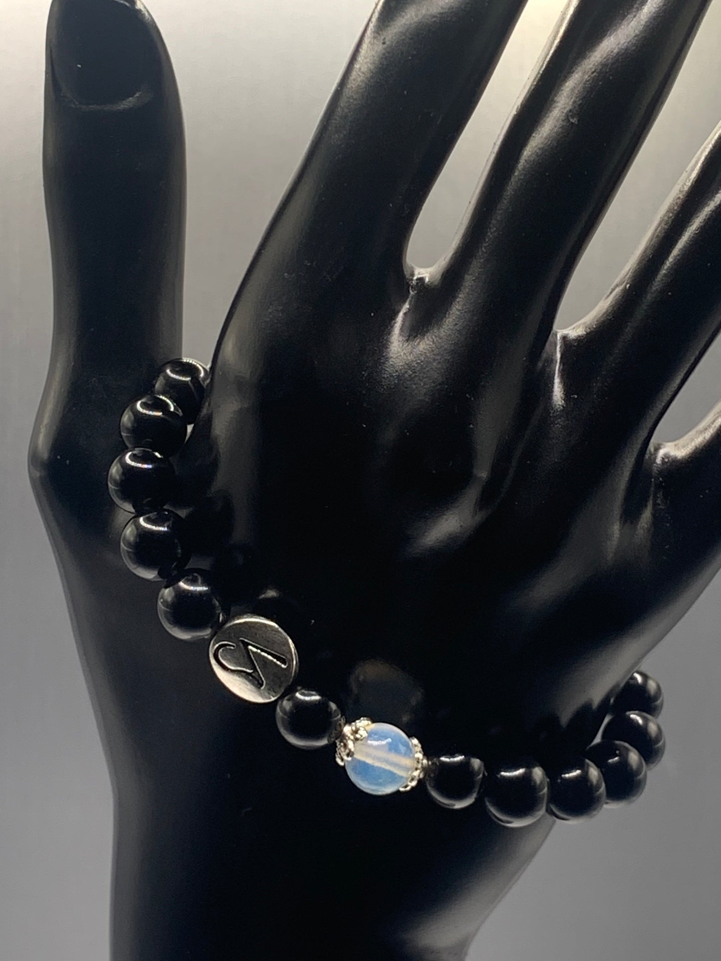 Capricorn Zodiac black obsidian with opalite elastic beaded bracelet with silver accents