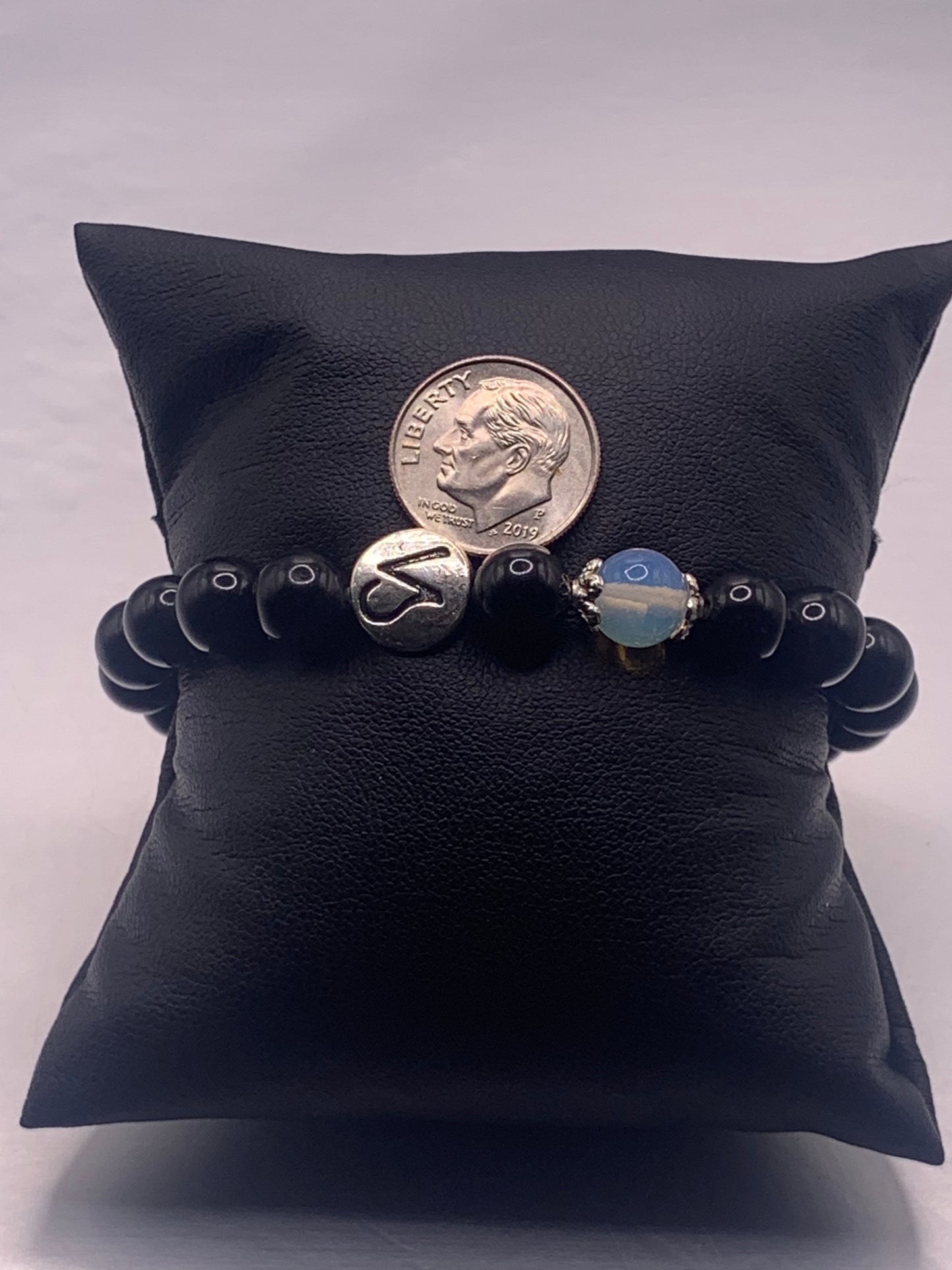 Capricorn Zodiac black obsidian with opalite elastic beaded bracelet with silver accents