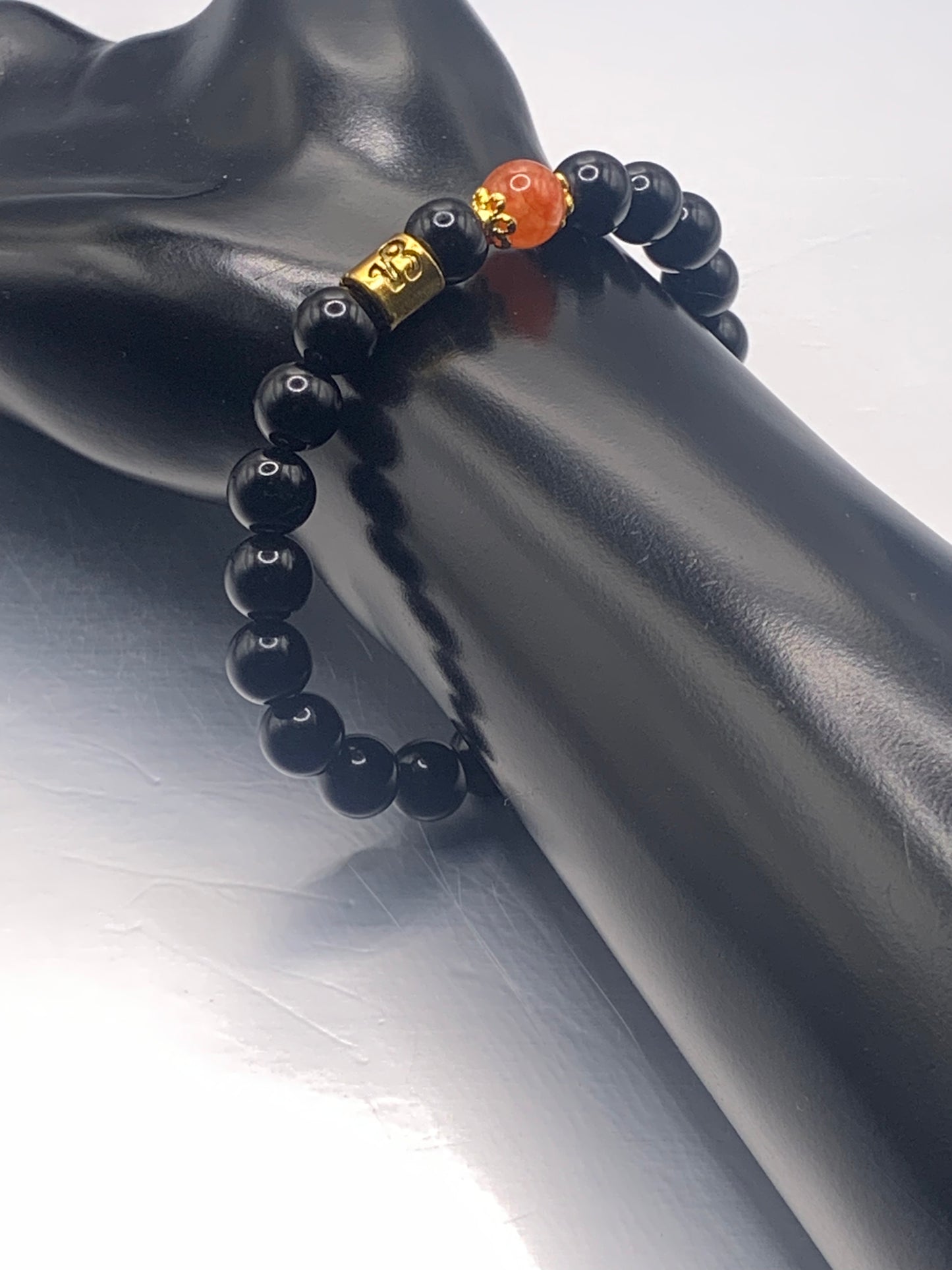 Capricorn Zodiac black obsidian with phoenix agate elastic beaded bracelet with gold accents
