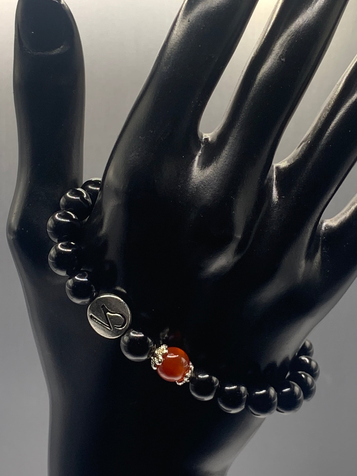 Capricorn Zodiac black obsidian with red agate elastic beaded bracelet with silver accents