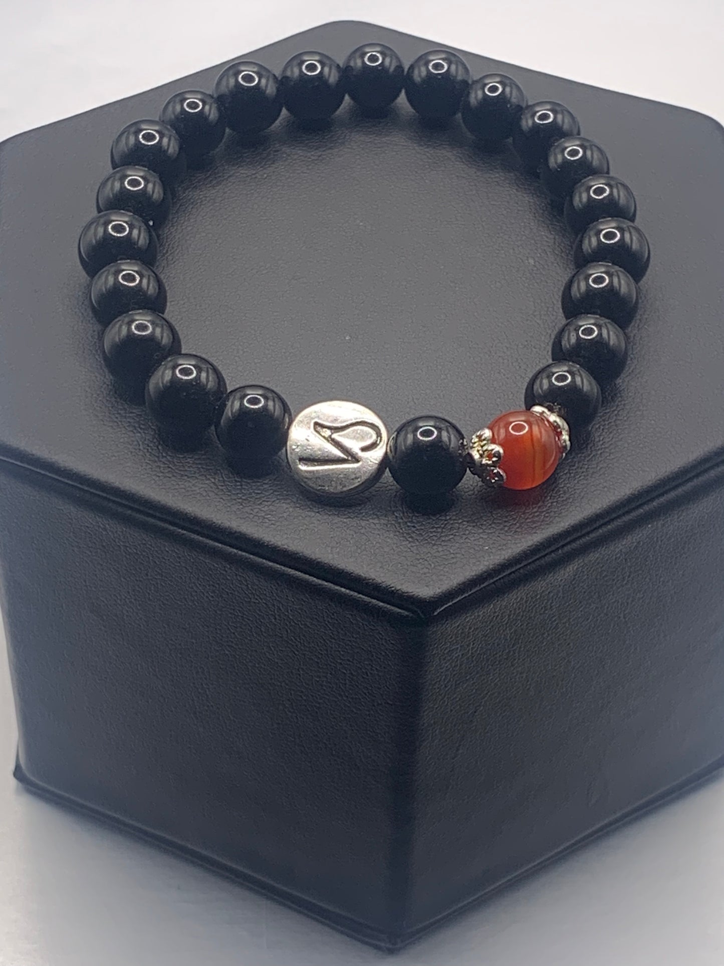 Capricorn Zodiac black obsidian with red agate elastic beaded bracelet with silver accents